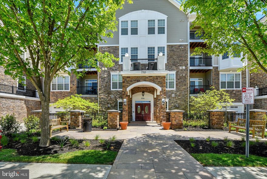 Rarely available Bradford model in sought-after Quarry Lake at Greenspring! This beautifully maintained 2BR/2BA + study elevator residence offers approximately 1,565 square feet of open, light-filled living space, plus the rare convenience of a private attached garage with additional storage. 

Hardwood floors flow throughout the main living areas, where the open-concept layout is ideal for both everyday living and entertaining. The spacious kitchen features granite countertops, stainless steel appliances, gas cooking, abundant cabinetry, and a generous breakfast bar overlooking the expansive living and dining area. Sliding doors lead to a private balcony with peaceful treetop views.

The oversized primary suite includes a walk-in closet and spacious en-suite bath with dual vanities and a glass-enclosed shower. A second bedroom and separate study offer excellent flexibility for guests, a home office, or additional living space. Full-size laundry/utility room provides added convenience and storage.

Residents enjoy exceptional amenities including a clubhouse, fitness center, pool, tennis courts, and scenic walking paths. Secure elevator building and attached garage complete this exceptional offering.