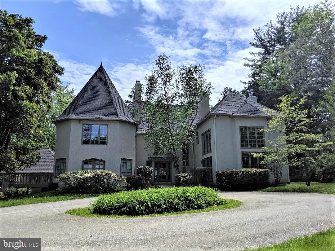 Just what you have been waiting for! Beautiful custom-built, Normandy-inspired Colonial nestled on a professionally landscaped one-acre property in the heart of Gladwyne. This home features superior construction, offering unique architectural details, stunning amenities and a flexible and open floor plan with generously proportioned rooms. The circular driveway leads to a flagstone walkway to greet guests and sets the stage for an equally impressive interior. Two-story Foyer with gas fireplace and oversized windows flood the entry with natural light. The fireside Living Room is also light filled as it too offers a two-story bank of dramatic windows. Cozy paneled Library features built-in bookcases and cabinetry, wet bar and French doors to patio and rear yard. Dining room accommodates intimate family dining or large-scale gatherings when entertaining. The white Kitchen features Sub-Zero refrigerator, Viking gas cooktop, double Thermador wall ovens, Scotsman icemaker, wine refrigerator and two dishwashers, (all stainless), a butcher block center island, breakfast bar, French door to patio and access to laundry and garage. Adjacent to the Kitchen is large Family Room with high ceilings, and French doors to a private deck. The award-winning swimming pool is perfectly situated for easy access to home. The Master Bedroom Suite is detailed with a tray ceiling, fireplace, a Juliet balcony overlooking the Living Room, walk-in closet and Travertine bath with oversized shower and Jacuzzi tub. The second bedroom includes an en suite Bath. There are two additional bedrooms serviced by Hall Bath. All bedrooms offer well-sized windows resulting in a cheery interior full of light. Hardwood floors throughout first and second floors are a plus too! New roof, gutters, downspouts, and fascia installed in 2019. This property is perfectly located in close proximity to the historic Village of Gladwyne, providing great privacy yet only a short stroll to Village conveniences. It is centrally located for an easy commute to Center City, close to all Main Line shopping and dining destinations and enjoy all the benefits of award-winning Lower Merion Schools. Also, Seller intends to file application for 2020 tax appeal to benefit next lucky homeowner. Hurry for your chance to call this house "home".