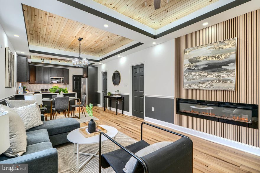 Welcome to 2200 N Longwood a fully updated ranch with style and space and many smart home elements, control the lights from your phone or Google Voice!  Features include wood and tray ceilings with recessed lighting, vinyl flooring, and a striking feature wall with fireplace. The gourmet kitchen offers quartz waterfall counters, stainless steel appliances, and a designer backsplash.
The main level has 3 bedrooms and 2 full baths, including a primary suite with fireplace and ensuite. The finished basement adds a rec room, 3 bedrooms, and 2 baths, with another luxury primary suite. Enjoy a screened porch and large backyard. Truly one-of-a-kind—don’t miss it!