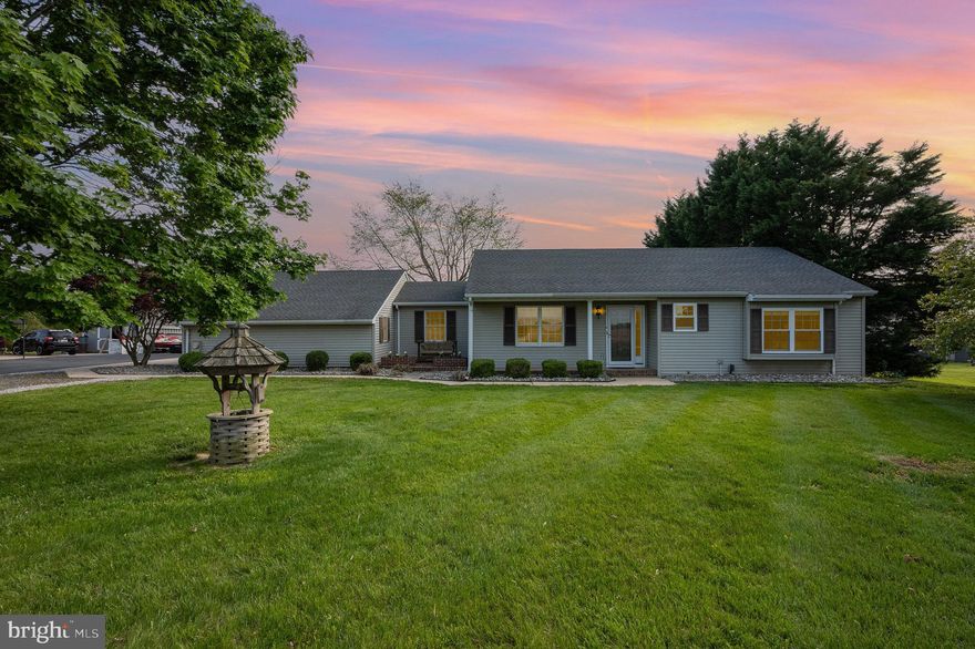 Beautifully renovated rancher just outside North Chesapeake City with an inviting open-concept that seamlessly connects the kitchen, dining, and living areas. The kitchen offers ample cabinet space, while the cozy living room features exposed beams and a charming brick wall with woodstove. Enjoy the bright and airy sunroom with barn doors and abundant natural light. The large laundry room is conveniently located off the kitchen and provides direct access to the garage. The spacious primary suite includes generous closet space and a private bath with a tiled shower and updated vanity. A second spacious bedroom and updated full bath in the hall offer comfort for guests and family. The oversized two-car garage is fully equipped with a mini-split unit (heat and A/C), workshop area, has access to the rear yard, and has steps down to the partial basement with additional storage and utility space. Outdoor living is a delight with a welcoming front porch, rear deck, patio, and beautifully treed yard offering privacy. Feeds into Chesapeake City Elementary, Bohemia Manor Middle & High School (buyer to verify). Centrally located a short distance from Chesapeake City, town of Elkton, and Bear, DE. Minutes to waterfront restaurants on the canal, marinas, and the C& D Canal trail. SAY YES to 705 Knights Corner Road! Highest & best offers due Sunday, May 4th at 8:00pm. Seller will make a decision on Monday.