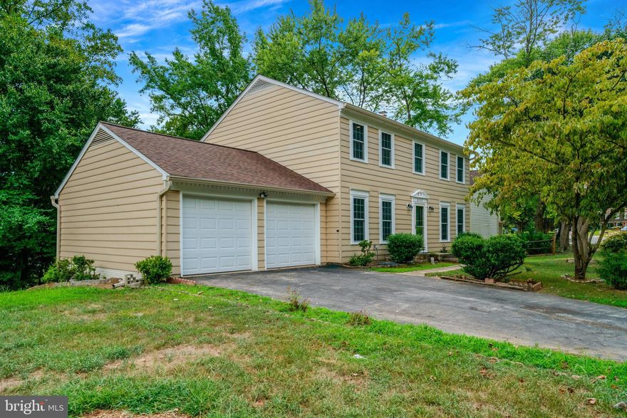 Welcome Home !!! Great location, cozy single family home, over 2,800 sq ft living space,  4 beds, 3 1/2 baths, double garage.  This property has over 180K in renovation.  New roof, new kitchen, new appliances, new W/H, new A/C unit,  new flooring, new bathrooms, new paint, recessed lightings .  Chimney just got cleaned and capped. On the main level, we have open floor plan, connecting kitchen and family room and a 1/2 bath.  Living and dining room are separated.     Lots of natural lighting through out the house.   Upper level features 4  bedrooms and 2 full baths.   Spacious primary bedroom with large walk-in closet, make up station with lights and a private full bath.  The other bedrooms share a full bath in the hallway.  Basement is fully finished, walkout to the backyard and a large rec room with a full bath on this level.   Extra storage around the house.  Close to Costco (Springfield), minutes to I-95, Fairfax County Parkway, VRE, metro and much more.  Schedule your showing today, your new home is waiting for you.