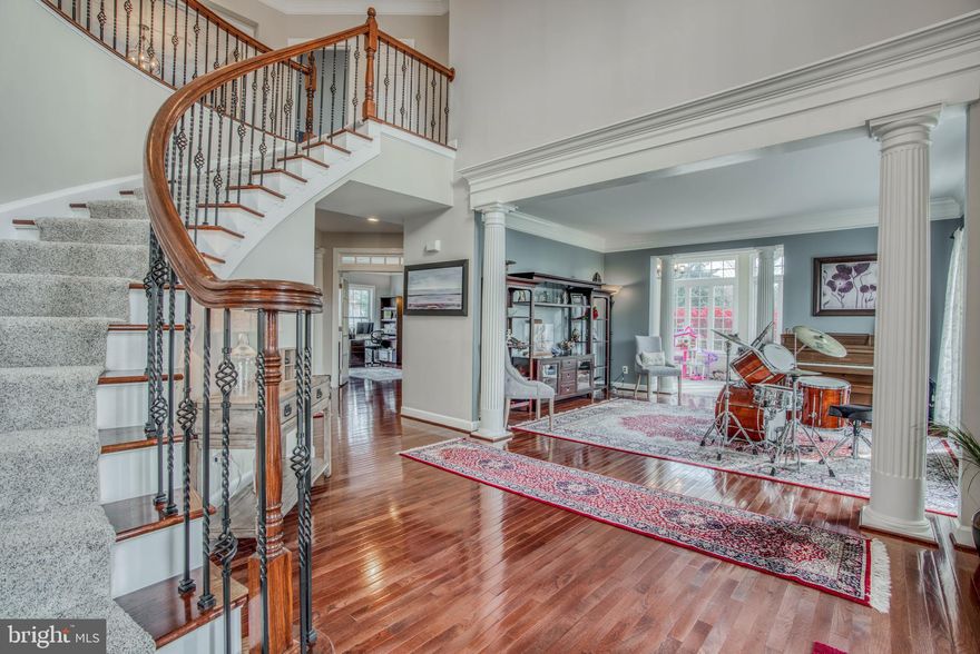 The search for your forever home ends here. From the minute you arrive, you ll be impressed by the extensive hardscape that surrounds this gorgeous stone-front colonial. With stone retaining walls and gardens accenting the front, the rear of the home boasts a large saltwater pool and separate hot tub, firepit, and fully fenced back yard. Inside you ll find every amenity on your wish list With many upgrades and fresh paint throughout, a sophisticated gourmet kitchen with center work island, granite countertops, stainless steel appliances and heated tile floors flow into a spacious mudroom addition (2017) that features vaulted ceilings, built-in cubbies, laundry, and charming barn doors.  Entertain guests in the formal dining and living rooms, or get comfortable in the sunroom area or in the additional family room that s complete with stone hearth and gas fireplace. A bright office with French doors, and powder room complete the first floor. Upstairs, a spacious owner s suite has a sitting area, two walk-in closets, and bathroom with soaking tub and separate shower, plus another Laundry room.  The lower lever offers the option for two additional bedrooms (no windows) or whatever you can dream including a craft room with built in cabinets. Addition includes Bar Area & Workout Room with heated tile flooring. This elegant 5,000+ sq. ft. home is situated on a beautiful 1.41 acre lot. 3 Car Garage.  Updates include 2 new HVAC units (2017 & 2018) Hot Tub resurfaced & new concrete around pool (2019), New Pool Pump (2019), Built in Firepit (2017), Refrigerator & Microwave (2 years old), New Dishwasher (2019).