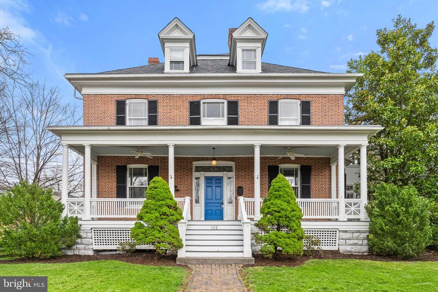 This elegant 7 bedroom home sits on a spacious corner lot in Winchester's historic district. The all brick construction sits on a native limestone foundation. The beautiful front yard is surrounded by a raised stone wall and overlooked by the large front porch offering wonderful space for entertaining or a comfortable to relax. The private backyard is great family space and play area and features a large flagstone patio with access to the beautiful sun porch, as well as a live turf putting green! Inside, beautiful hardwood floors throughout the home complementing large rooms with high ceilings. The first floor features front and side entrances, large central hall, elegant parlors on either side of the entry, the large and equally elegant dining room, each with a fireplace, a office or study, and the inviting sun porch and a spacious modern eat-in kitchen. On the second floor is the charming primary suite with modern bath and fireplace. Second floor also includes 3 other bedrooms, a second bath, and laundry. On the third floor are 3 more bedrooms, a full bath, and plenty of storage. The property is zoned RO1 the first floor could be used as office with living space on the second and third floor. What a house!