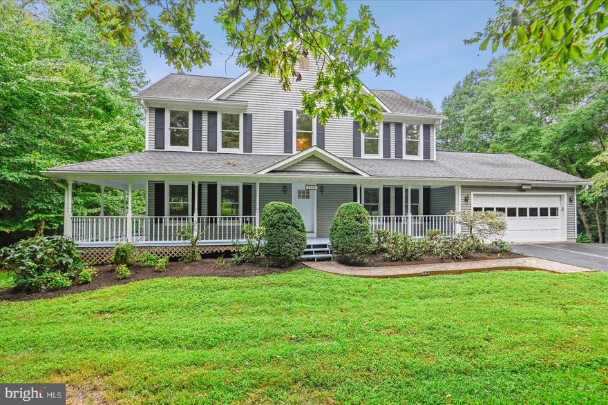 Fabulous opportunity to own a 3 level colonial on a premium 5.45 acre lot just outside Historic Clifton, VA.  Covered wrap around front porch.  2 story entrance foyer and brand new front door.  Traditional hardwood flooring on two levels.  9 foot ceilings on the main level. Large formal living room and separate dining room with antique ceiling light.  Eat-in kitchen with lots of counter space.  Family room with brick fireplace and brand new patio door.  Separate laundry room on the main level.  Four generous size bedrooms on the upper level.  The primary bedroom has a big walk-in closet and a bathroom suite with jetted soaking tub and separate shower.  The unfinished walkout basement offers endless possibilities.  Brand new HVAC system.  Freshly painted throughout.  This home features a ham radio antenna tower that conveys.