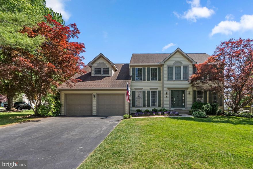 Must see 4 bedroom, 2.5 bath, 2-car garage colonial on a prime ⅓ acre corner lot in sought-after Reservoir HS district of Howard County! Features include: fully owned solar panels (2016) generating approx 15,000 kWh/yr (approx $3,000 savings/yr); new water heater (2024); upgraded vinyl siding; GAF architectural roof (2012); new gutters w/leaf guards (2024); updated eat-in kitchen w/LG stainless steel appliances (2021), quartz counters, island w/breakfast bar, Smartcore Pro flooring, breakfast nook w/bay window, and pantry w/upgraded shelving; spacious family room w/vaulted ceiling, floor-to-ceiling brick surround wood-burning fireplace and replaced Pella slider to updated low-maintenance Rhino Deck; separate dining and living rooms; 1st floor office w/bay window and new carpeting; main level laundry room w/new LG washer/dryer (2024) and utility sink; upper level features new carpet throughout, a primary suite w/dual closets (1 walk-in), en suite bath w/whirlpool tub, dual sinks, a separate shower, and linen closet; fully finished walk-up lower level w/expansive rec room and abundant storage; private fenced backyard; upgraded attic insulation; replaced garage doors (2024). Convenient access to I-95, Rt 29, Rt 32, shopping, dining, Baltimore, and DC. No HOA fees!