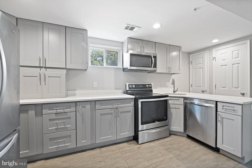 Charming & Versatile Home with Multifamily Potential!  Welcome to this well-kept property offering comfort, space, and flexibility. The main level features 2  large bright bedrooms, a full bath, and a spacious kitchen perfect for everyday living. The lower level boasts its own full-sized kitchen, a bedroom, a full bath, family room and a large storage room, along with separate washer/dryer connections on both levels—an ideal setup for a multi-generational household or potential rental income.

 Outside, you’ll find a long driveway with parking for up to 6 cars and a big, flat backyard.

Enjoy peace of mind with installed updates in 2018:  HVAC system, hot water heater, and windows.