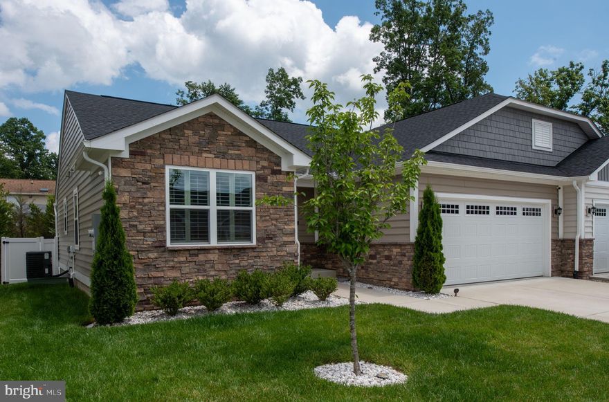 Welcome to 8859 Marlow Dr in a sought-after 55+ community! This 3BR, 2BA home offers easy one-level living plus a full walk-out basement for extra space. The bright, open layout is move-in ready and filled with natural light. The lower level is perfect for a rec room, office, or guest suite. Added upgrades include a stamped concrete patio, vinyl fencing, epoxy garage floor, gutter guards, and an irrigation system for low-maintenance living.
Enjoy the community pool and clubhouse while being just minutes from Spotsylvania Courthouse, Lake Anna, shopping, dining, and commuter routes. A versatile home offering comfort, lifestyle, and value at $415K — schedule your tour today!