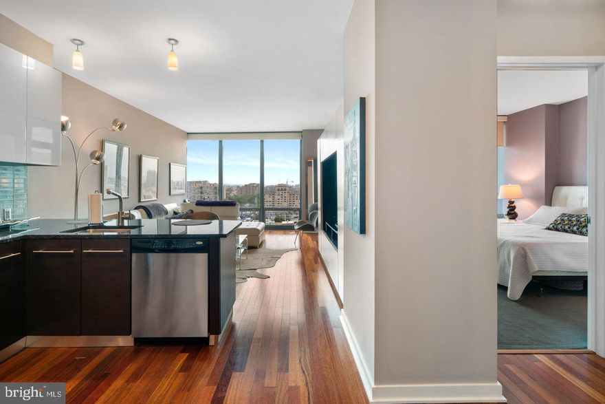 Modern Urban Sanctuary with Art Museum Views + Parking & Storage
Welcome to Residence 1408 at The Murano, a luminous 1-bedroom, 1-bath retreat spanning approximately 743 square feet, complete with assigned  garage parking and a separate storage locker — rare perks in this market.
Step inside to discover north-facing, floor-to-ceiling windows that flood the space with natural light while framing iconic Art Museum and city skyline views. This sleek, open-concept layout is elevated by hardwood floors,  9-foot ceilings, and fine details like custom automated shades, blackout curtains in the bedroom, and built-in closet systems.
The kitchen is designed for both style and function: granite counters, stainless appliances, and a clean, modern aesthetic. In-unit convenience continues with full-size, front-loading washer and dryer tucked away discreetly.
When it comes to amenities, The Murano delivers a full suite of luxury services: 24/7 doorman/concierge, fitness center with Peloton bikes, a 60-foot indoor pool, a sundeck for lounging al fresco, and an elegant residents’ lounge for entertaining or quiet escapes.
Location is everything, and this residence is at the heart of it all. You’ll walk to Trader Joe’s in minutes, and hop over to Rittenhouse and Walnut Street for world-class dining and shopping. Commuters will appreciate the proximity to 30th Street Station, UPenn/Drexel, and Philadelphia’s major hospitals—everything is within reach.
Your next move is clear: this is not just a condo, but a lifestyle. Schedule your private showing today.