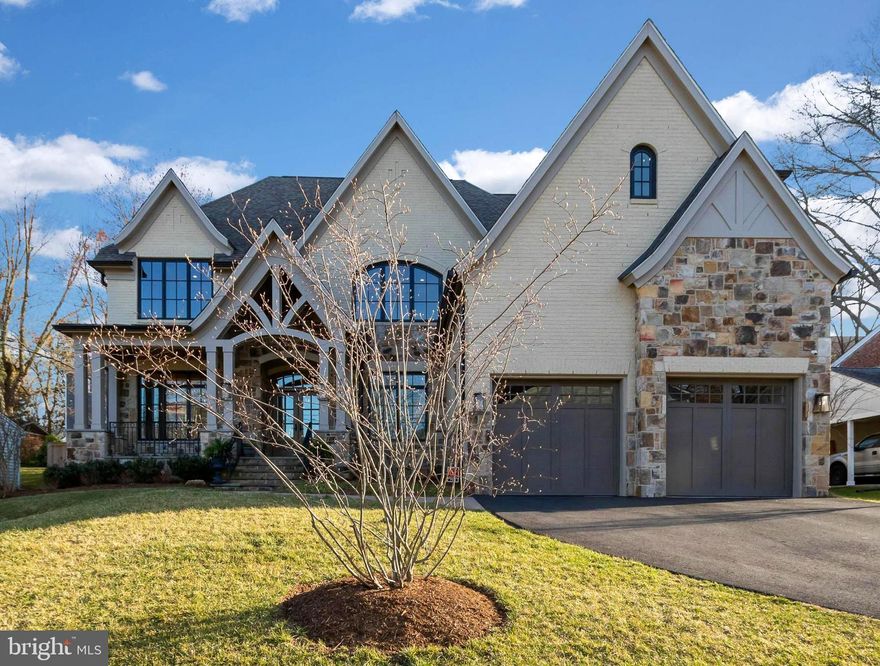 Meticulously maintained, your search is over when you enter this three year young Georgetown Home 'The Grace' model where modern luxury is beautifully intertwined throughout the home's well executed, French Country design. No expense is spared and the attention to detail and quality craftsmanship is evident from the moment you step on the front porch. The Grace gives its owner an incredible 7400 sqft of space to enjoy and live in. You will find oversized 5-bedrooms, 5 full baths and 2 half baths along with numerous spaces for elegant entertaining, relaxing or for everyday living and memory making. This home gives its owner a multitude of premium features to include Restoration Hardware fixtures, electric blinds in the family and office, stunning crown molding, coffered ceilings, white oak hardwood floors on main and upper levels, custom cabinetry with inset doors, hardwired security, CCTV and NUVO in-home audio, heated mudroom floor and dog shower. The kitchen is a chef's dream and you will find yourself wanting for nothing! Here you will find quartz countertops, WOLF cooking appliances, a SubZero side-by-side refrigerator and freezer, an Asko dishwasher, a large walk-in pantry and sun filled breakfast dining area surrounded by glass paned doors and open to the family room with impressive floor to ceiling stone gas-fireplace. Entering the master suite presents an opportunity to feel as if you're going on vacation at the end of each day. Here you will find a sitting room with a comforting fireplace, a spacious dressing room with two large walk-in custom-built closets. Continue on into the luxurious master bath with its heated tile floor and shower with warm towels at the ready. The lower level offers more space in which you could entertain or simply unwind and relax at the end of day. The open layout gives you the ability to design multiple areas that work best for you! In case you need another, here you will find a third gas-fireplace, a billiards and game room, a SubZero wine storage and SubZero drawer refrigerator and freezer, and a sizable exercise room. Storage in this home will never be an issue, from top to bottom there are numerous closets and storage areas where one can perfectly store pretty much anything! The fenced in yard space has been designed well with its gorgeous landscaping, covered porch and stone patio. The home also offers a built-in elevator shaft to all three floors that allows for any family needs that may arise. Located inside the beltway, this home is less than a mile to downtown McLean & 495, minutes to Tysons Corner & GW Pkwy and a quick 15 minutes to downtown DC