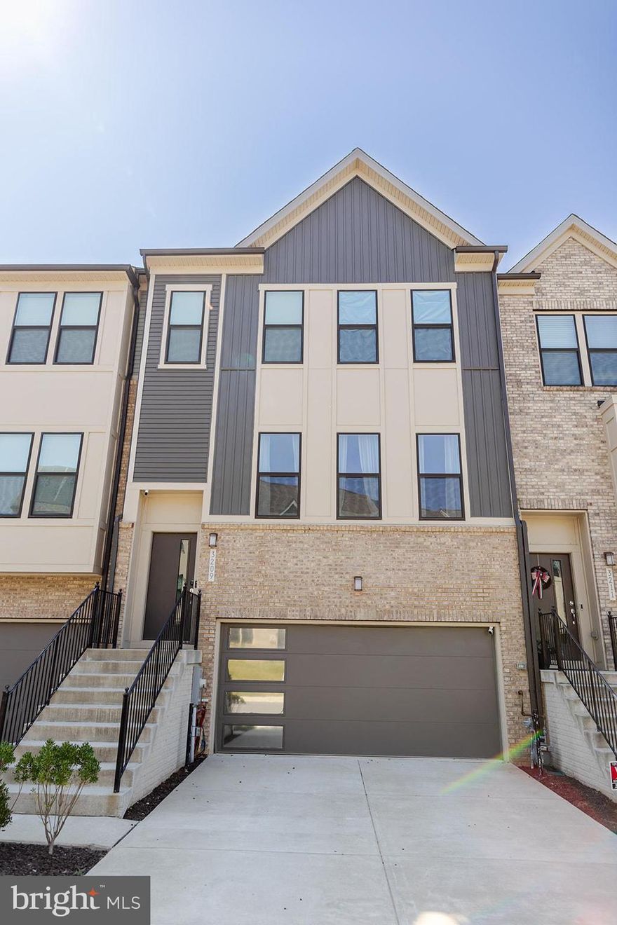 **16K PRICE IMPROVEMENT!!**Welcome to 3209 Merganser Dr! Move right into this beautifully maintained and luxuriously styled townhome featuring 4 bedrooms, 3.5 Full bathrooms boasting over 2500 total sq ft in the highly sought after Watershed Community. The main floor has a welcoming and elegant open concept living space that showcases gleaming hardwood floors and tons of natural light in the front and rear of the home.  The spacious dining room opens up to the chef’s style kitchen featuring quartz countertops, white shaker cabinetry, subway tile backsplash, matching stainless steel appliances and a 3-seat island with tons of storage space.  Rounding off the main level is a large pantry space and powder room adjacent to the kitchen.  The outdoor space off the main level includes a new full length Trex deck that is perfect for weekend BBQ’s or winding down after a long day at work.  The upstairs features 3 bedrooms and 2 full bathrooms including the primary suite/en suite, highlighted with a sizable walk-in-closet and an upgraded bathroom featuring a glass encased shower, soaking tub and dual vanity. The additional upstairs bedrooms provide options for guest quarters or home office all with tons of natural light and closet space for all your storage needs.  The second floor is also home to a generously sized laundry room with newer side by side washer/dryer units.

The bonus space in the lower level is highlighted by an additional family room area with walk-out access to the fenced in backyard. The 4th bedroom maximizes the remaining space giving you options for a home gym, bedroom or dedicated office space that comes with its own ensuite bathroom. Rounding out the basement is a two car garage with additional storage space and driveway parking. Located in Watershed, a premier master-planned community, residents enjoy resort-style amenities including a clubhouse, multiple pools, fitness center, playgrounds and miles of trails.  Conveniently located near amenities with easy access to major transportation routes, shopping, restaurants, close proximity to Ft Meade, BWI Airport and more! This home offers a perfect blend of comfort and convenience for a fulfilling lifestyle. This one will not last long, schedule a showing today!