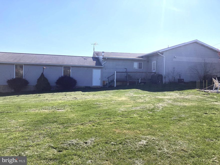 Great price for this rare opportunity! Place your business conveniently  before the faithful workforce at the existing complex across the street AND the coming workers to the new complex being built right behind this prime lot. Convenience store, restaurant, or any of the many zoned uses will be sitting pretty.  This 1.19 acre lot screams potential.    Zoned Industrial Enterprises. Want to secure the lot for the future?  Property currently has 2 residences with a large commercial size vehicle garage which recently housed a fuel delivery service.   Place tenants and enjoy the income until you're ready to build a business. Property has easy access to I81 and other major routes and has a steady clientele in the area.  The warehouse property behind this is progressing nicely.  Start your business here!