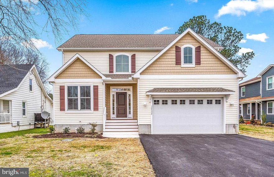 Rare new construction in desirable Cape Isle of Wight location.  5 Bedrooms including first floor bedroom.
Main areas of first floor LVP, bedrooms carpet.  Floor plan has keeping room with fireplace off  island kitchen and separate family room.  Granite kitchen countertops with stainless steel appliances.  Primary bedroom and two of the secondary bedrooms have large walk-in closets.  Rear deck off the keeping room is low maintenance composite with vinyl rails. Ready for IMMEDIATE occupancy.   Seller to provide $20,000 gift certificate for furniture, blinds or shades.   Seller to pay $10,000 towards closing costs.  
Taxes are on land value only.