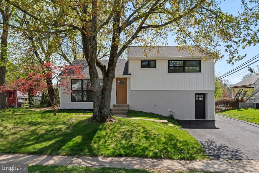 **SHOWINGS BEGIN FRIDAY APRIL 17TH**

Welcome to 1453 Doris Road — a fully gut-renovated 3 bed, 3.5 bath home in Abington, PA offering over 2,050 sq ft of modern living across three levels. Every system is brand new: plumbing, electrical, HVAC, roof, siding, and gutters, with a striking exterior featuring new black windows, white vertical siding, stucco lower facade, and a freshly paved 4-car driveway.

Inside, soaring vaulted ceilings and wide-plank LVP flooring set the tone on the main level. The open-concept kitchen features brand new stainless steel appliances, quartz countertops, a custom island, and a custom-built pantry. The family room offers a wood-burning fireplace flanked by a custom wood slat accent wall and a convenient powder room. Recessed lighting flows throughout every room in the home.

From the master down to the basement, every bathroom delivers a high-end finish that stands out.​​​​​​​​​​​​​​​. The master bath features beautiful porcelain tile, a floor-to-ceiling tiled rain head shower, and a floating vanity with LED mirror. The hall bath offers a soaking tub, large format stone-look tile, and a backlit LED mirror. The basement bath includes a tiled walk-in shower with hexagon mosaic floor.

The finished basement offers bonus living space, a full bath, and a custom mudroom with built-in bench, shoe storage, and shiplap accent wall. 

Outside enjoy a large backyard and mature tree-lined surroundings.
This is turnkey living at its finest.