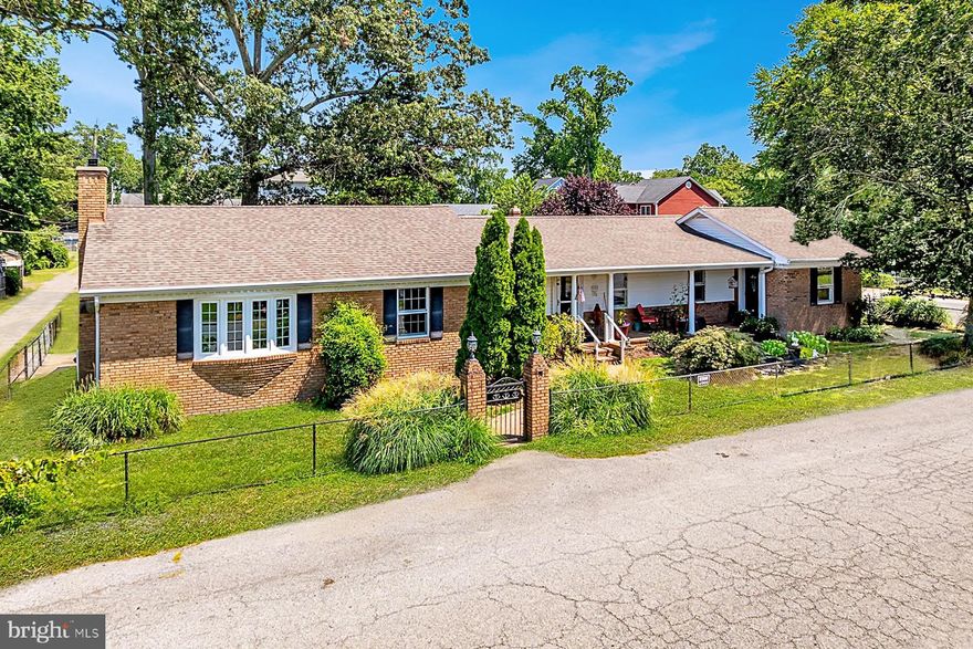 Beautiful ranch style home with fully fenced yard, corner three lots within town limits. New large front windows and sliding door. Extra large living room with beamed ceiling with new propane fireplace to keep you cozy in the cold weather with a wet bar for entertaining.  Large en-suite master bedroom plus two additional bedrooms with large closets. Plenty of storage. Outside a large workshop/storage shed, beautiful fountain with pump in front, large enough to have fish. Large deck in back and large front porch. Multiple deeded parking spaces. New HVAC, windows, remodeled bathrooms. Close to shuttle bus to DC.  Close to boardwalk and beach. Close to schools, restaurants, and shopping.