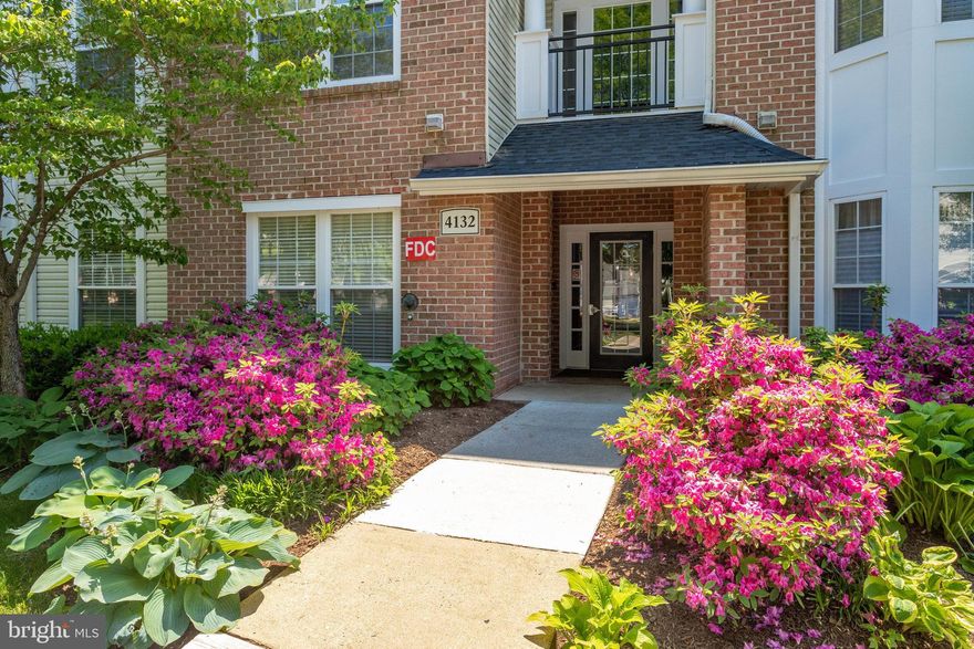 Absolutely beautiful top floor condo in Random Hills, walkable to Wegmans and shopping at Fair Lakes! Lots of natural light! This updated 2 bed/2 bath ensuites boast an open floor plan with vaulted ceilings, updated kitchen with stainless appliances and gas cooking, gas fireplace, and private patio. Huge closets! In unit, full size washer and dryer and parking in single car garage!  Community pool and tot lot. Easy access to I-66. Extra parking permit available for small fee. Coded building access. Water and trash included.