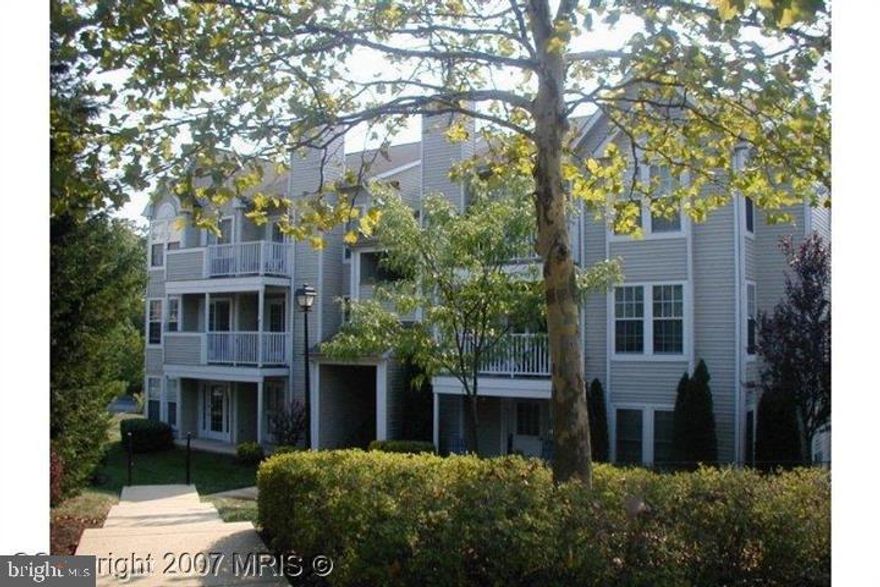 Super cute, super accommodating 1st floor unit with loads of natural light in a peaceful setting.  Main level entry with no stairs!  Two bedrooms and one full bath, with full sized laundry area. Eat-in kitchen with breakfast bar and gas range cooking.  Cozy fireplace for warm winter evening entertaining.  Recent updates include beautiful LVP flooring and  fresh and neutral paint throughout, including kitchen cabinetry.  Convenient to all commuting routes. On the market Wednesday Nov. 5th.