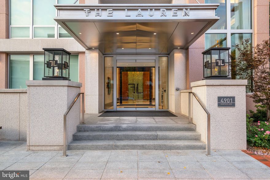 LAST AVAILABLE PENTHOUSE AT THE LAUREN! Welcome to The Lauren, Bethesda's premier 34-unit boutique luxury residential condominium building located right in the heart of downtown Bethesda built for the most discerning buyer. The Lauren offers a rare opportunity to indulge in iconic architecture and white-glove service while being right in the middle of all Bethesda has to offer. Outside your door is Bethesda Row's famed restaurants, cafes, shops and entertainment. Enjoy ultimate convenience in an incredible location with The Lauren's 24-hour full service concierge, valet parking, fitness center and on-site building engineer.    Residence 602 showcases three-bedrooms and three-and-a-half bathrooms with over 3000 square feet of lavish living space. Direct access elevators open right into your own private foyer with grand marble floors. Enter the residence to the family room with breathtaking panoramic city views, airy natural sunlight, 9-foot ceilings and a striking white marble gas fireplace. High design features include large-plank dark gray hardwood flooring, tray ceilings with custom lighting, and state-of-the-art home automation. The family room opens to the impeccable chef?s kitchen with top-of-the-line appliances including Sub-Zero and Wolf. Custom white cabinetry with under cabinet lighting, built-in wine refrigerator, thick slab white marble countertops with bar seating and space for kitchen table complete this luxuriously designed kitchen. Enjoy entertaining both indoors and outdoors with separate formal dining room and multiple terraces throughout this residence. The master suite offers city views of Bethesda Row, two spacious walk-in closets and double pane windows for reduced noise. The master bathroom offers a delightful retreat with oversized glass enclosed white marble rain shower with bench seating, spacious dual vanity, premium Waterworks fixtures and soaking tub. This floor plan features a separate laundry room with full size washer/dryer, an elegant powder room and two additional bedrooms each with an en-suite white marble bathroom, walk-in-closets and have access to an outdoor balcony. The residence conveys two ample sized parking spaces, a private wine locker and a storage unit. The Lauren offers residents superior entertaining options with the private Onyx Lounge and wine bar and an expansive rooftop deck, both areas equipped with a catering kitchen. The building has taken impressive steps to safely accommodate its residents during this time. Don't miss this incredible and rare opportunity to own a brand new penthouse in The Lauren!  Video Tour: https://properties.wayupmedia.com/v2/4901-hampden-ln-602-bethesda-md-20814-us-602861/videos/20099