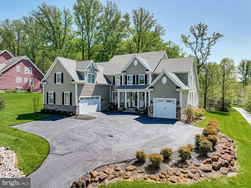 BACK ON THE MARKET (FINANCING FELL THROUGH AT THE LAST MINUTE)

INSPECTIONS DONE AND REPAIRS COMPLETED.  HOUSE DID APPRAISE.

MOVE IN READY !!  IMMEDIATE OCCUPANCY.

A statement in elegance.  Beautifully designed and executed.  Multigenerational living and or first floor primary suite living.  Welcome to 307 Bonheur Avenue in The Preserve at Severn Run in Gambrills, you feel like you are in the country but are so close to everything you need, major highway access, shopping and entertainment.  This home features a grand two story 14' x 14' foyer entry with curving staircase to upper level and hardwood flooring.  Elegant moldings abound.  The formal dining room is to the left as you enter with access to kitchen for easy entertaining.  Moving in from the foyer, you enter the heart of the home, the living room and kitchen.   The living room boasts hardwood flooring throughout into the kitchen, a stone fireplace, recessed lighting, beautiful moldings and access to the back yard.  The kitchen has an island, under counter lighting, beverage cooler, all the appliances in stainless steel, a breakfast bar and generous kitchen table space with access to the screened porch and back yard deck and patio.  The entire main level has nine foot ceilings (foyer is 2 story).  There is also a spacious home office/playroom/bedroom, a large laundry room, a mud room with coat closet from the 2-car garage to inside the home.  On the other side of the main level, there is a private suite, with a 1-car garage and entrance to the suite from the 1-car garage.  The suite features a large living area with wet bar area, full bathroom, walk in closets and generously sized bedroom all on the main level.  Lastly there is a powder room for guests on this main level.  The Upper Level boasts a spacious primary suite with bedroom, two walk in closets, a generously sized ensuite bath with soaking tub, large shower, dual sink vanity and commode closet.  Bedroom 2 on the upper level has an ensuite bath, walk in closet and Bedroom 3 and 4 share a buddy bath, and each have walk in closets.  Above the 2 car garage with access from the mud room, there is a  multipurpose room with walk in closet and attached full bath for yet another bedroom suite.    The lower level boasts 10 foot ceilings, a family room area, a recreation room area, a full bath.  There is plenty of space for a generously sized bedroom next to the bathroom, a future media room or home gym and plenty of utility and storage space. Outdoor entertaining areas include a screened porch, deck and hardscape patio overlooking the serene back yard.   This home is like new and only 7 years old.  There is so much living space, and 6 current bedroom/bathroom spaces, with the possibility of making the office a bedroom and building out the room in the lower level for 2 additional bedrooms.  Please refer to the floor plans in the photos and also located in documents.  Please see the video in the link.

Keywords: multigenerational living, main level bedroom, bedroom first floor, two primary bedrooms