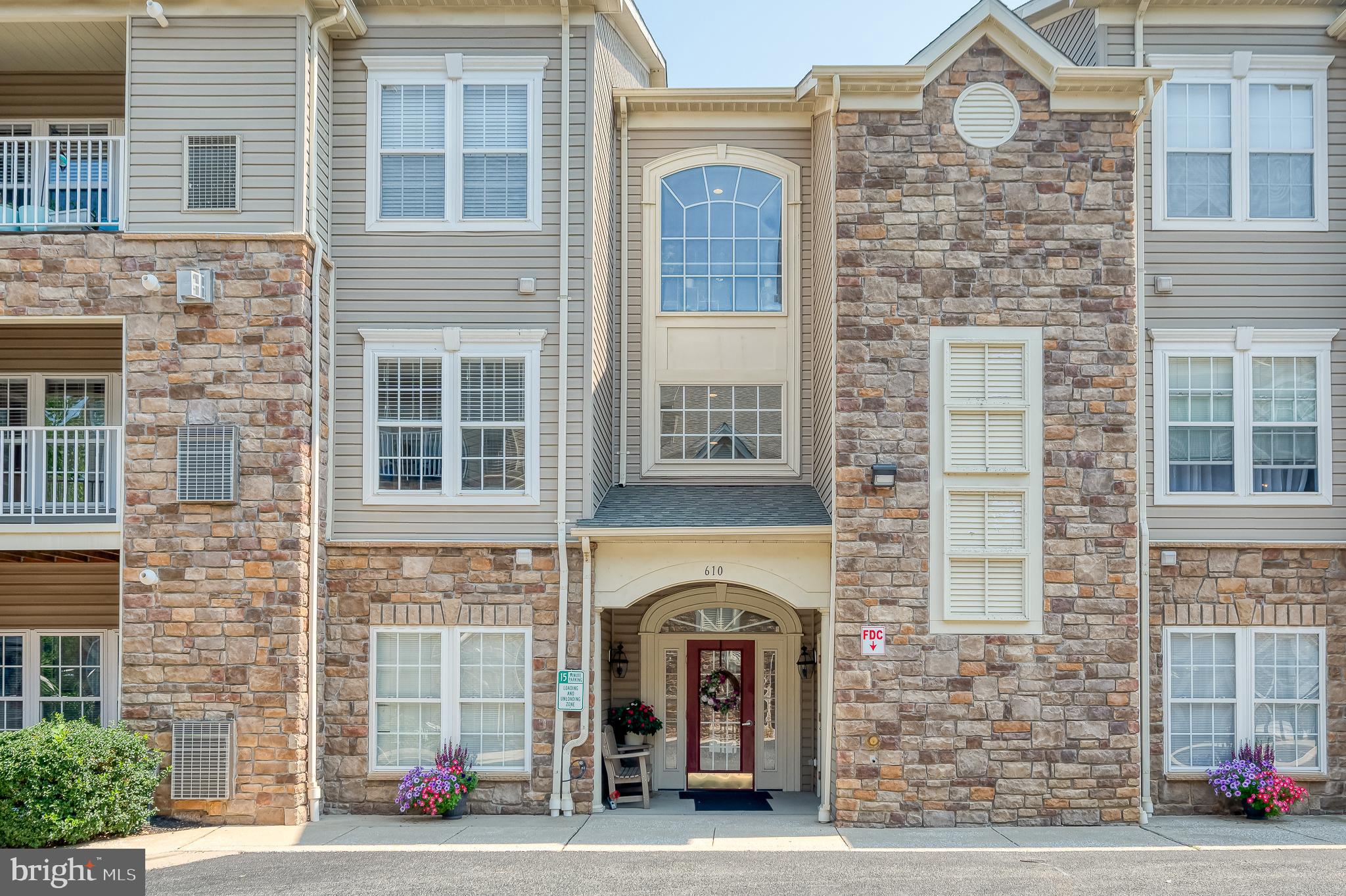This absolutely pristine 2 bedroom, 2 bath, 2nd Floor unit w/Elevator in 55+ Community offers 1,580 sq. ft. of thoughtfully designed living space, perfect for comfort and convenience. Step inside to find an inviting open floor plan that seamlessly connects the living, dining, and kitchen areas. The well-appointed kitchen features ample table space, a pantry, and modern appliances making meal preparation a delight. Enjoy cozy evenings by the gas fireplace, or unwind in the spacious Primary Bedroom Suite with sitting area, huge walk-in closet and bathroom designed with accessibility in mind, featuring a walk-in shower & dual vanity. 2nd Bedroom and Full Bath perfect for guests. Additional interior highlights include window treatments that enhance privacy and natural light, as well as a dedicated in-unit laundry area with washer and dryer. Plus plenty of room for belongings with an in-unit walk-in storage room and additional storage area on floor. New Water Heater (2024) & New HVAC (2024). Relax and enjoy morning coffee or evening cocktail on the covered rear porch. Outside, the community boasts beautifully maintained common grounds with picnic area,, plenty of parking & inviting sidewalks for leisurely strolls. Residents can enjoy the convenience of an elevator and the peace of mind provided by secured building entry & intercom system. With included amenities like lawn maintenance, snow removal you can spend more time enjoying life and less time worrying about upkeep. Embrace the comfort and community spirit that Moores Mill Crossing has to offer & convenience to the town of Bel Air shopping, restaurants, MA/PA Trail & More !