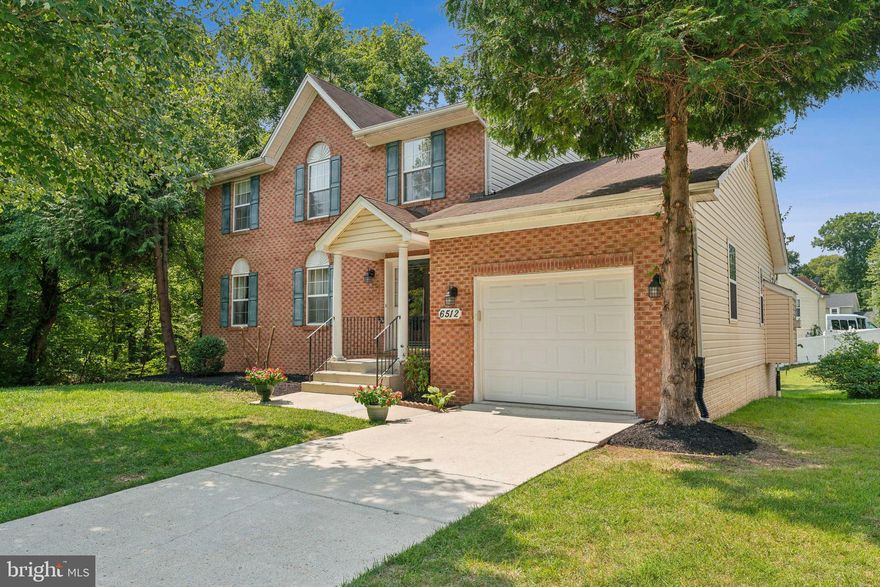 Discover exceptional value in this spacious colonial nestled in the heart of Lanham. This impressive home boasts five bedrooms and three and a half bathrooms, spread across three levels of comfortable living.  The open floor plan is perfect for entertaining, with a grand foyer adorned with gleaming hardwood floors that seamlessly connect the kitchen, family room, and formal living spaces. The latter, complete with plush carpeting, offer a quiet retreat for relaxation or hosting gatherings. The cozy family room features a marble surround gas fireplace, creating a warm and inviting atmosphere. The heart of the home is the gourmet eat-in kitchen, complete with a convenient island and built-in shelving.  Upstairs, four well-appointed bedrooms await, including a primary suite with a spa-like ensuite bathroom featuring a soaking tub, separate shower, and well lit vanity. The lower level offers versatility with a spacious recreation room, the 5th bedroom, a full hall bathroom, laundry room, and ample storage space.  Enjoy outdoor living on the deck or brick patio, perfect for entertaining or relaxing.  Prime location: Easy access to major commuter routes (I-495/95, Rt. 50, 295/BW Pkwy, and Rt.450) with just an 8-minute commute to the DC line. Surrounded by well-maintained parks, recreation, shopping, schools, hospitals, and public transportation options, including the New Carrollton Metro Orange line (with upcoming Purple line access) and MARC/Amtrak train.  This stunning colonial offers the perfect blend of space, style, and comfort. Don't miss this opportunity to make it your own!