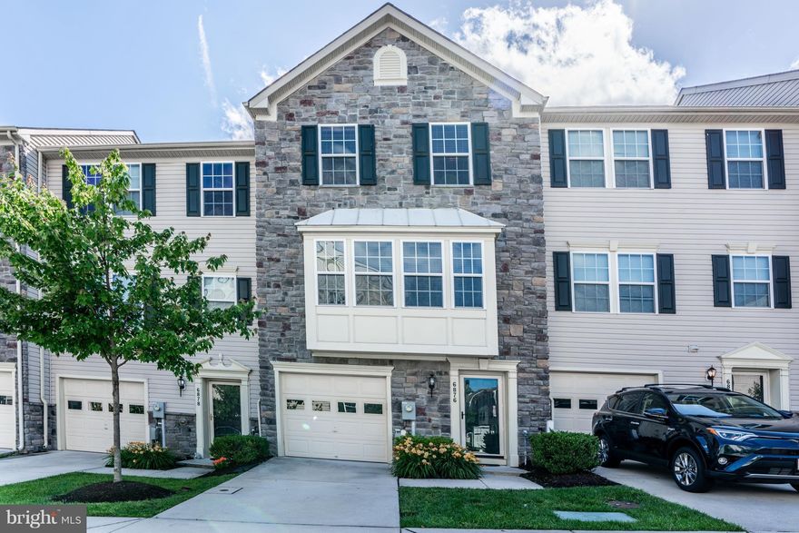 Spacious garage front townhouse in sought after Belmont Station community. Large family/rec room with half bath on main floor. 2nd floor has a living room, kitchen, dining area and access to rear deck. Master suite, 2 bedrooms and a full bath on the 3rd floor. Community offers: pool, clubhouse, 24 hr gym, theater room, playground and so much more. Don't miss this beautiful home!