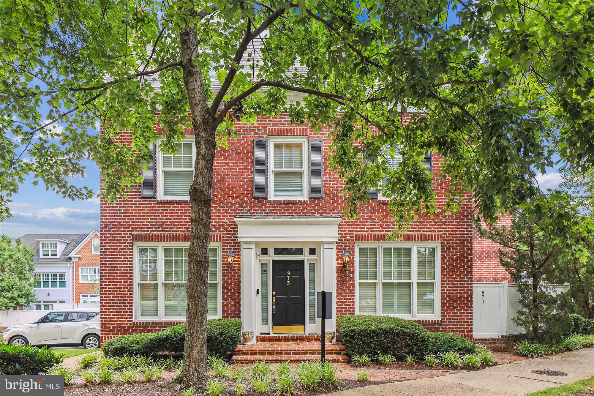 Welcome to 973 Powhatan Street — a sunlit, fully renovated end-unit townhome in the sought-after Old Town Gateway community. Set on a peaceful, tree-lined street just minutes from the waterfront, this home offers the perfect blend of modern comfort and classic charm in one of Alexandria’s most walkable yet tranquil neighborhoods.
Across three thoughtfully designed levels, you’ll find hardwood floors, 9 ft high ceilings, and generous natural light throughout. The designer kitchen features Cambria quartz countertops, GE Profile appliances with built-in air fryers, KitchenAid refrigerator and dishwasher, and high-end cabinetry with custom spice rack, cutlery organiser, a pantry and an exterior kitchen vent for clean airflow. Elegant, designer lighting in both the dining room and breakfast nook enhances the home's warmth and charm. The bright breakfast nook opens to a private brick patio — perfect for morning coffee or evening unwinding.
The powder room has been stylishly remodeled with a standalone designer sink and elegant finishes.
Upstairs, the spacious and well-lit primary suite overlooks a quiet green street and the private parking area. The en suite bathroom is fully remodeled with Cambria countertops, premium Delta faucets, high-quality cabinetry, and floor-to-ceiling porcelain tile. The guest bathroom is fully renovated and has never been used — ready for its first-time enjoyment. On the top floor, a private bedroom with an attached full bath offers ideal flexibility for guests, a home office, or creative retreat.
Additional features:
• New HVAC (Lennox Elite) water heater, washer & dryer (2025)
• Professionally encapsulated crawlspace with automatic dehumidifier
• Two side-by-side deeded parking spaces
• Ample storage throughout.
Just blocks from Trader Joe’s, Harris Teeter, Braddock Metro, and steps from all the charm of Old Town — without the noise or congestion of King Street. Enjoy a peaceful, community feel with unbeatable walkability and access to D.C., National Landing, Amazon HQ2, Mount Vernon trail, and Ronald Reagan Airport (all < 10 min away).
The home is wired with dedicated Verizon Fios and offers high-speed internet throughout — ideal for remote work, streaming, and smart devices. WiFi and exterior security cameras can be transferred to the tenant — ask your realtor for details.
Modern luxury, smart design, and a location that gives you the best of Old Town — without the stress.