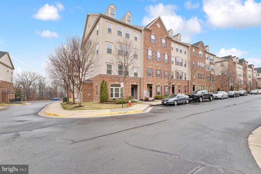 Beautifully maintained end-unit condo in sought-after Virginia Manor, nestled within the Dulles Farms community. This inviting home features a classic living room and a well-appointed kitchen with a center island and granite countertops, complemented by graceful wood flooring throughout the main living areas. The spacious layout offers three bedrooms, two full baths, and a convenient half bath. Step outside to a private terrace—perfect for morning coffee or evening tea. Thoughtful upgrades include beautiful tile work, upgraded cabinetry, built-in speakers, and custom lighting. Enjoy resort-style community amenities such as clubhouses, fitness centers, tot lots, tennis courts, the Dulles Farms pool, and scenic walking trails. A warm, friendly neighborhood and an exceptional place to call home. Professional photographs coming soon.