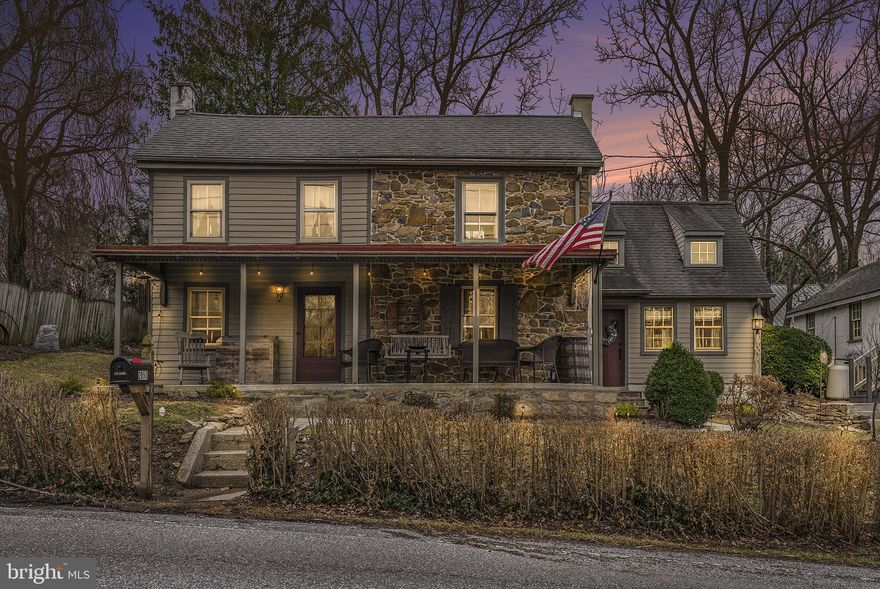 This is a fantastic opportunity to own a charming 1870's farmhouse, without the upkeep of a farm, located in the quaint Village of Harmonyville, Chester County! The house is part of the Historical Society for those who have a passion to preserve history!  Spend your summer evenings relaxing on the covered front porch. As you enter the beautiful, newer addition, you’ll immediately be impressed with features such as vaulted ceilings with open beams, extra windows, hardwood floors and a cozy fireplace. The spacious great room seamlessly flows into the kitchen area, perfect for those who love an open floor plan. Adjacent to the kitchen is the dining area as well as the bathroom, which has been updated and features a clawfoot tub and updated hardware as its focal point. At the front of the house, a large room showcases a stunning exposed stone wall (see staged photo with stone wall). This space can be used as one or two living areas or can be easily converted into a first floor bedroom with a simple partition for privacy. A ceiling access allows for easy furniture transport up to the second floor. The primary bedroom is located on the second level featuring beautiful hardwood floors as well as an open beamed ceiling. Off of the primary bedroom is a bonus room, ideal for a walk-in closet, office or extra storage. Above the garage is a second bonus room ready for your creative ideas - whether as a craft room, art studio or entertainment area. Enjoy breathtaking views from the covered deck above the garage, perfect for relaxing and taking in nature’s beauty. An outdoor pavilion in the backyard is also an inviting outdoor getaway with lovely views. All hardwood floors have been refinished in 2022, giving the home a fresh, updated feel. Minutes away from St. Peter’s Village as well as French Creek Park.  All furniture is negotiable!