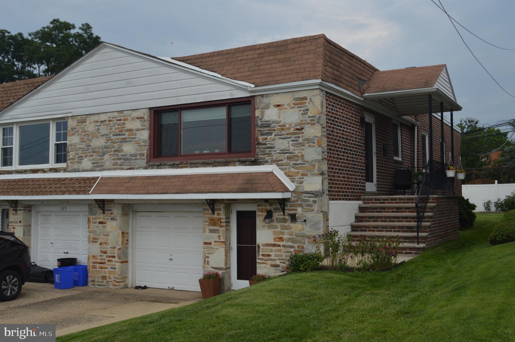 Welcome home to this tasteful modern decor home located in a great neighborhood within walking distance to Wissahickon Valley Park. Many recent improvements have been made to assure that you can enjoy this lovely home for many years to come. As you enter the home, you will first notice the desirable open floor plan. The Living Room has new sliding windows that allow the natural light to pour into the terrific living space; a refreshing breeze can also be enjoyed with simply opening the windows. The beautiful Kitchen is an inviting space for the amateur chef! Attractive colors and cabinetry add personality and charm. A wonderful five burner gas range is great for those family meals. For the holidays, roll out the cookie dough on the spacious and convenient island that is illuminated by pendant lighting. The Kitchen also features stainless steel dishwasher, drawer microwave in the island, oversized, deep sink, refrigerator, tile backsplash, and stylish stainless steel oven vent. Entertain your guests in the Dining Area located just off the Kitchen. The Primary Bedroom is spacious and includes plenty of closet space. There are two other bedrooms and an updated tile bath that finishes out the first floor. You will marvel at the bright hardwood floors that exist throughout the entire living space. Downstairs an inviting and roomy Family Room is perfect for movie night with family or friends. The decor is warm and comfortable, and you will spend countless hours there. There is an additional space just off the Family Room that is great for an office, hobby room, or play room. A Powder Room is also available. Access to the basement level garage, and the laundry space fill out the lower level. The backyard will provide you with endless hours of back-to-nature fun. Get you hands in the dirt in the small vegetable garden that features tomatoes, peppers and eggplant. A patio includes a fire pit and a roll out awning where you can enjoy a cold iced tea on a warm summer's evening. Other points of interest include new HVAC in June of 2020, new tub/shower and floor in main Bath, new toilet, vanity, light fixtures and paint February of 2022, new windows on entire first floor in December of 2020, plenty of closet space, Nest thermostat, washer and dryer remain, and Simpli Safe security system. This is a very nice home in a desirable neighborhood, so call to make an appointment to see it now!