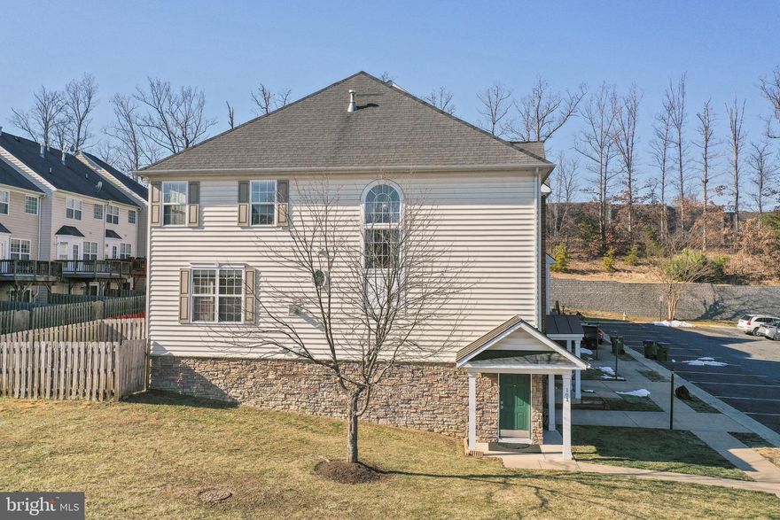 Two videos available to enjoy viewing this lovely end unit.  One of the largest units in the area with  2784 finished sq ft home that is conveniently located right next to I-95 for ease of commuting through Northern Virginia.   Gorgeous hardwood flooring on the main level and carpeting in all bedrooms. 
The entry level basement has a full size bathroom with a recreational room for family and guest, the basement floor was replaced in 2021 with vinyl plank flooring as well as new carpeting on the stairs leading to the main level, the stairs leading to the upper level and all the bedrooms. The nice finished garage takes you to the hall on the basement level.  The home is stoked with natural lighting throughout. Lovely dinning room/living room adjacent to kitchen with enough space to entertain family and guest. A marvelous fireplace to keep those winter nights extra warm and cozy. A spacious kitchen with a quaint island for additional storage and counter space, as well as an spacious pantry.
On the second upper level is the extensive Primary Bedroom with En Suite and two additional bedrooms.  Not only is this closely located to I-95 but down the road is The Stafford Market Place with many places to enjoy a weekend out on the town. Many options such as Starbucks, Chipotle, Chik-Fil-A, and so much more to temp your cravings. You have Home Choice as  Home Warranty provider. The home has a 1 car garage with additional parking in the driveway as well as in the neighborhood for overnight quest. This is the home for you, don't look any further!