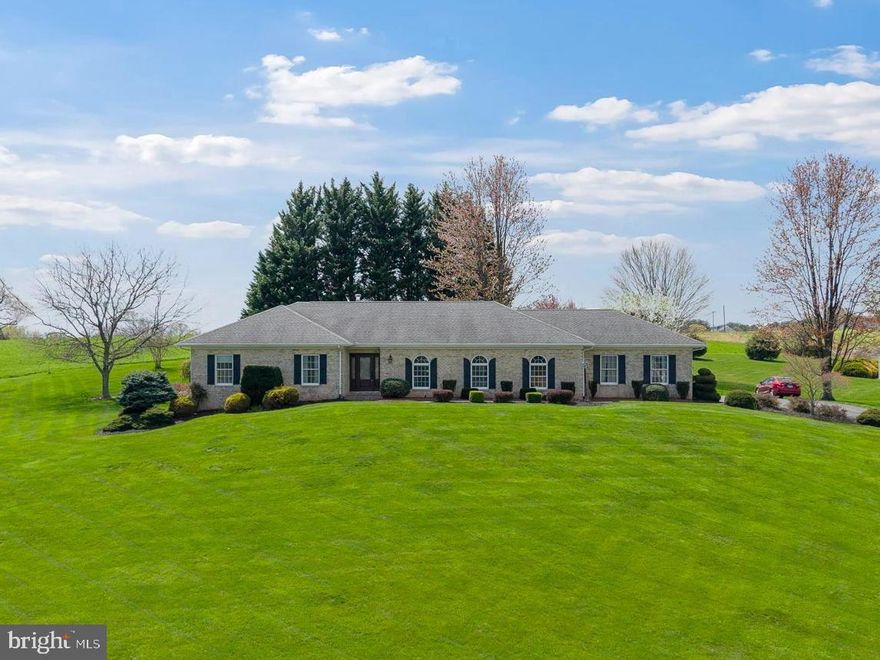 Homes like this are not available often. Welcome to 1111 Wheatland Ct, a custom-built brick rancher set on 3 acres, offering picturesque views in a peaceful cul-de-sac. This meticulously maintained home boasts over 4,000 square feet of total space, featuring 9-foot ceilings, 3 bedrooms, 2 full bathrooms, and a side-load 2-car garage. The main level is highlighted by hardwood floors and includes a formal living room, dining room, family room, eat-in kitchen, and 3 spacious bedrooms, including a large primary bedroom with an updated ensuite bathroom. Enjoy outdoor entertaining on your custom-built covered patio, surrounded by scenic views and professional landscaping. The expansive, unfinished basement is a blank canvas, ready for your personal touch. Experience the tranquility of country living, while being just minutes from Bel Air, restaurants, shopping, and major commuter routes.