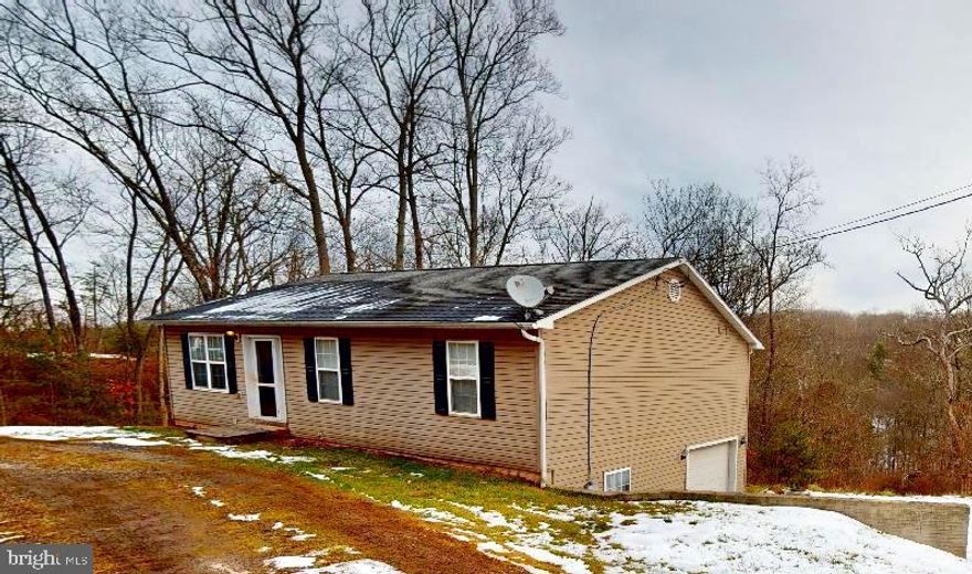 BACK ON THE MARKET!  (No fault of the home or Seller).   Not far from US RT 50 and just a short distance on a secondary road you will find this 4 bedroom 3 bath home on 2.5 acres of WV living.  One level living with the bonus of additional bedroom,  bath, family room and laundry  on the lower walk out level.  For someone wanting to reside in WV but has the need of working in the Winchester VA location this could be a good location.