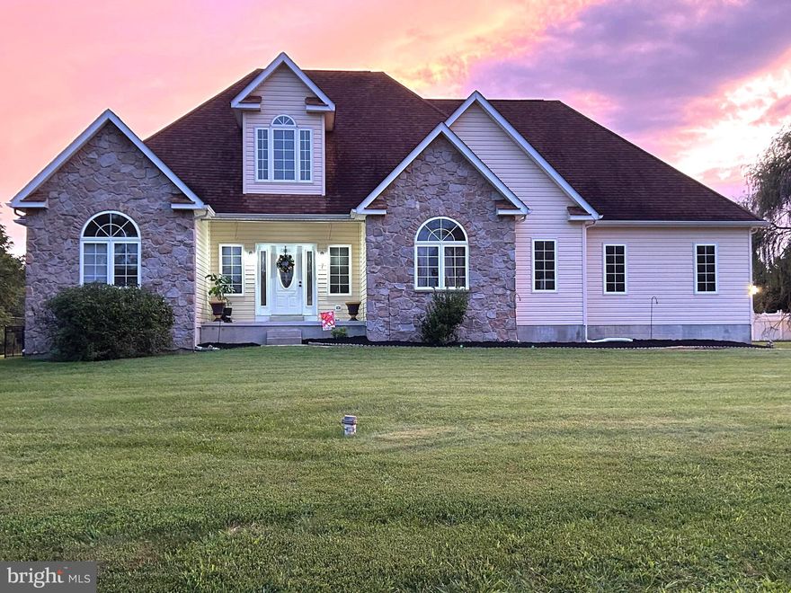 This stately and well-maintained  3 bedroom/ 2 bath home, offers 5000 sq ft of living space, and sits on .69 acre on a corner lot.  The kitchen offers expansive oak cabinetry, upgraded appliances, eat-in kitchen with a breakfast bar, 5-burner gas range w/convection, a microwave, and French door refrigerator. All overlooks the family room, so you are not separated from your guests. The dining room boasts a coffered ceiling treatment and large windows offering natural light. Vaulted ceilings, laminate and hardwood flooring give the home a warm welcome. The sunroom includes a gas fireplace, and an entrance of handcrafted wood barn-style doors with waterfall glass. AND, this walks out to the screened porch overlooking the pool  If a staycation is in your future, what better way to spend it than floating in your vinyl lined pool that comes complete with all the accessories., including:   liner (replaced in 2020), variable speed pump, filter system and robotic cleaner, and pool floats. The home also has some handicap accessible features with a ramp in the garage, grab bars in the primary suite, and 36” doorways to accommodate a wheelchair.  A FEATURES and UPGRADES SHEET IS UPLOADED in the LISTING
and will also be in the HOME. One additional, important (and expensive feature)---the unfinished basement was built with Superior Concrete walls and there is plenty of room to finish. A must see!! Marinas are minutes away. There is even a third level which is framed and has its own supplemental electric box so the buyer(s) can finish it to their specifications