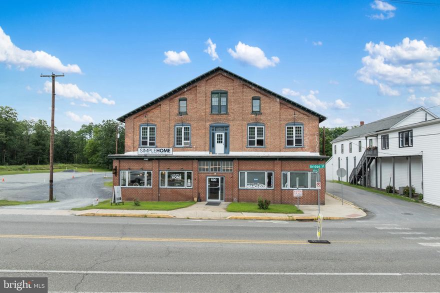 Unlock a rare investment opportunity in the heart of Weissport Borough with The Hofford Mill - a 35,000+ SF mixed-use commercial property situated on 10.3 acres, just minutes from the scenic Lehigh River and D&L Trail. This historic mill has been thoughtfully repurposed and now serves as a vibrant hub for hospitality, retail, events, and creative workspaces. The property features long-standing tenants, including a popular restaurant (The Gorge Eatery), a boutique bicycle shop, salon, and event hall, with ample space for further development or repositioning. Current income is supported by multiple leases and subleases, with the potential to increase NOI through expansion or redevelopment. Zoned Commercial Industrial (CI), the site allows for flexible use - ideal for investors, developers, or owner-users seeking to capitalize on the growing Carbon County tourism economy. The site offers off-street parking, loading access, public water/sewer, and strong visibility just off Route 209 and minutes from the Mahoning Valley exit of the PA Turnpike (I-476). Whether you're looking to expand your portfolio or launch your next concept in a high-character property with built-in foot traffic and regional appeal, The Hofford Mill offers unmatched potential in a uniquely walkable setting. Showings by appointment only. Financials available with NDA along with Offering Memorandum.
Recent: