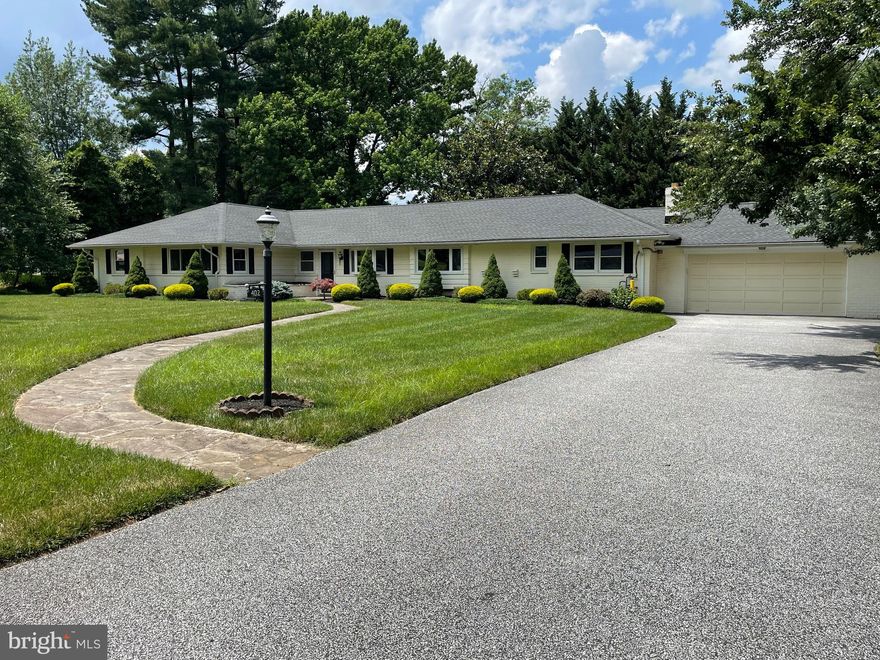 Welcome to 402 Ivy Church Road — a beautifully maintained brick and redwood rancher in the sought-after Valley Crest neighborhood, nestled in the heart of Timonium’s Garden Residential District. This highly desirable pocket of Timonium, defined by the lush, tree-lined communities between Dulaney Valley and Pot Spring Roads, offers a rare blend of natural beauty, neighborhood charm, and everyday convenience.

This inviting 4-bedroom, 2.5-bath home combines the ease and comfort of single-level living with a bright, open floor plan that flows seamlessly between formal and informal spaces — ideal for both sophisticated entertaining and relaxed family life. Expansive, energy-efficient windows fill the interior with natural light, creating a warm and welcoming atmosphere throughout.
Just off the formal dining room, a versatile fourth bedroom with a private entrance and patio offers flexibility as a home office, guest suite, family den, or in-law space — perfect for today’s multi-functional lifestyle.

Property Highlights
•