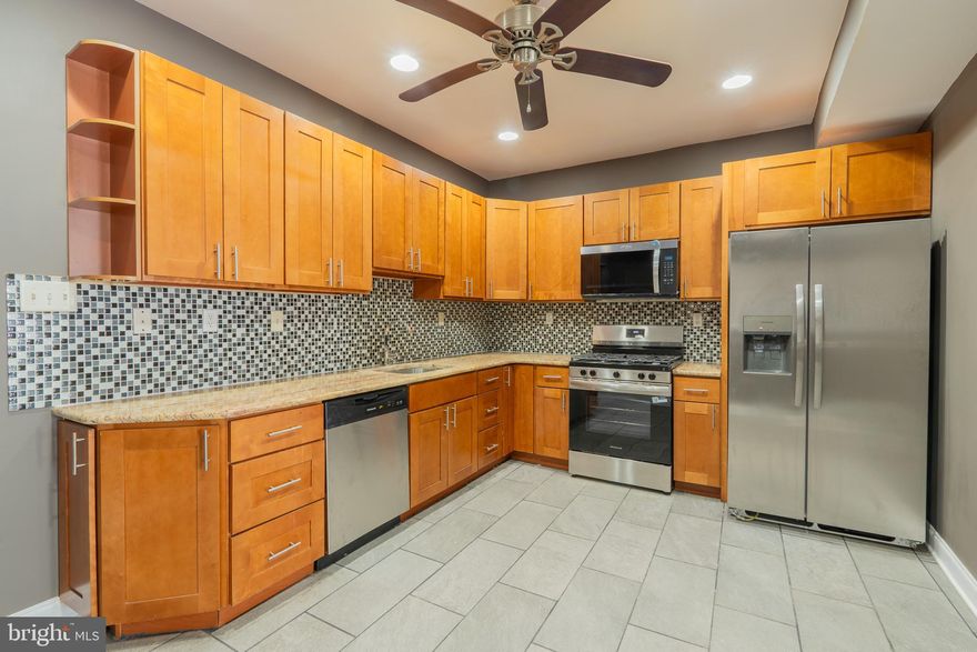 Welcome to 4630 Edmund St, a beautifully updated 5-bedroom, 3-bath home located in the Frankford section of Philadelphia. This spacious property offers an open and inviting layout with modern finishes throughout.

The main level features a large living and dining area with updated flooring, recessed lighting, and plenty of natural light. The kitchen is a standout, offering ample cabinet space, granite countertops, stainless steel appliances, and room for meal prep and entertaining.

Upstairs, you’ll find generously sized bedrooms with great closet space and updated bathrooms. The home has been freshly painted and well maintained, making it move-in ready for its next owner.

Additional features include central air, multiple full bathrooms, and a semi-private fenced rear patio—perfect for relaxing or entertaining outdoors.

Conveniently located near public transportation, shopping, and major roadways, this property offers both comfort and accessibility.

Don’t miss your opportunity to own a large, turn-key home in a growing Philadelphia neighborhood. Schedule your showing today!