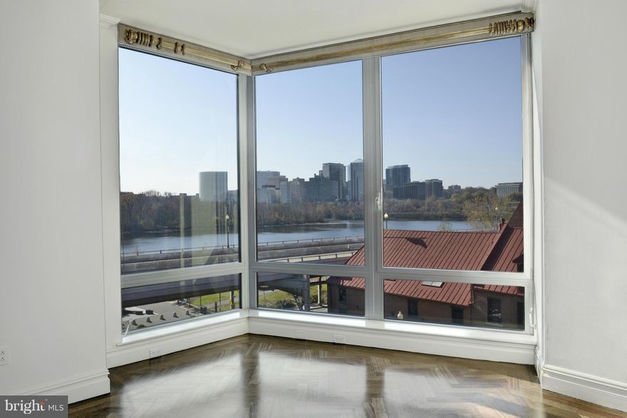 TREMENDOUS VALUE - PRICED TO SELL!  3400+/-SF floor plan w/ gracious entertaining flow throughout principal rooms w/ stunning Potomac/Key Bridge vistas. Library w/exquisite built-ins. Kit w/attached Breakfast Room. Lux Master Ste. Lrg Office Ste. 2 Car Garage Pkg. Endless amenities & service in the Georgetown Ritz. Original Floor Plan was 3 Bdrms/5.5 Bas-easily transferred back.