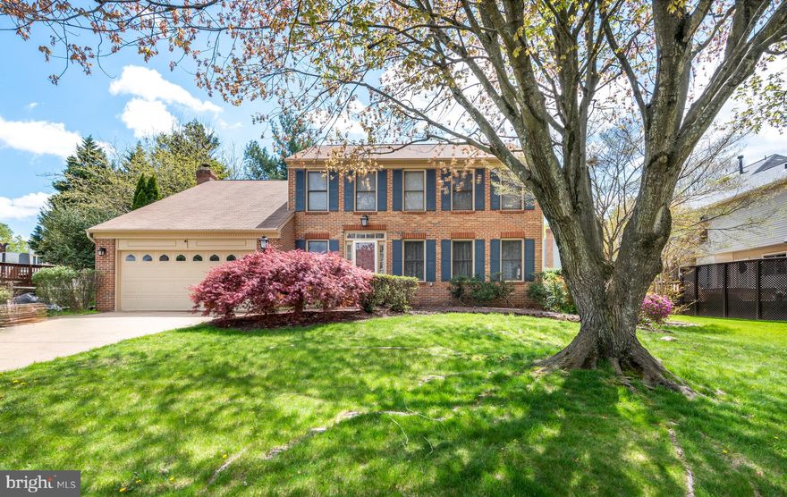 This gorgeous, brick front colonial in sought after Wellington/Cloverhill community is close to all commuter routes, neighboring proximity to VRE and expanding area including Amazon Web Services Data Center. This home had a large renovation in 2017 with new hand scraped hickory hardwoods that remain in pristine condition throughout the main floor, up the stairs, and upper level hallway, crown moldings in each room, updated fixtures, and custom built ins around an updated gas fireplace! Open floor plan kitchen to family room has tons of natural light flooding in, with bay bump out windows and a large window over the kitchen sink looking out to the fenced in back yard. This gourmet kitchen has gas cooktop, large pantry, kitchen island, high quality granite, custom backsplash and white cabinets. Downstairs has a large 12 foot wet bar perfect for entertaining, built in entertainment center and new LVP flooring, recently renovated full bath with walk in shower and walk up access to back yard. On the upper floor there are 4 full bedrooms all incredibly spacious, with crown moldings, a fan and large windows. The owner's suite has a custom shelving system added to the walk in closet, recessed lighting, vaulted ceiling and ensuite. Expansive deck with trellis and stone patio sits perfectly inside the privately fenced back yard. Recent upgrades include: Hot water heater 2017, Roof 2010, LVP flooring in basement and more! Garage cabinets convey. Minutes from the Historic Old Town Manassas Museum.  Deadline for offers is Tuesday 4/20 at 5pm.