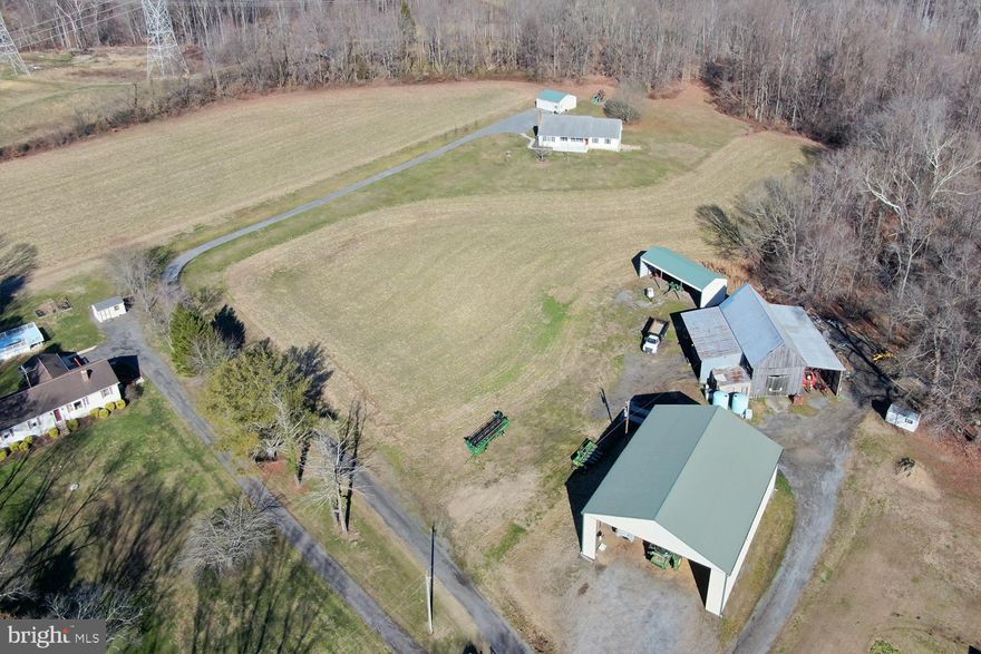 HUGE PRICE REDUCTION DON'T MISS OUT - FARM / LAND !  22.22 ACRES in TRACYS LANDING ALREADY PERCED!!  2 Butler Manufacturing (premium pre-engineered metal) outbuildings for equipment and vehicle storage.  The larger Butler building has electric.  Additional rustic Maryland tobacco barn.  Gravel access roads and parking areas. * 30 Minutes to Annapolis; 60 Minutes to Baltimore; 40 Minutes to D.C.  A RARE PASTORAL PARCEL PACKAGE!