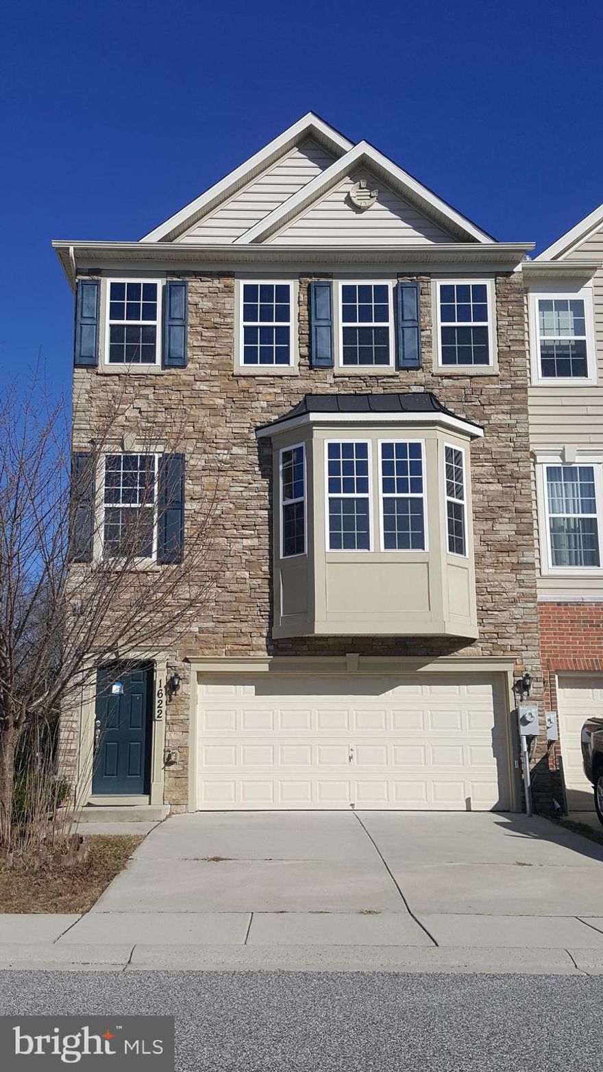 Spacious end of group 3 bedroom, 3.5 bathrooms, 2 car garage townhouse in Prospect Green.  Enter into the basement level featuring a bright family room, full bath, garage access,  storage closet, and utility room.  Open main level layout featuring two family rooms both with fireplaces, one with a half bath and one with access to the rear deck.  Kitchen with center island, stainless steel appliances, and pantry.  Master bedroom with tray ceiling, walk-in closet and private bath with soaking tub, separate shower and dual vanities.  The upper level also features two additional bedrooms, full bathroom, and laundry room.  Nearby parks, shops, and commuter routes.