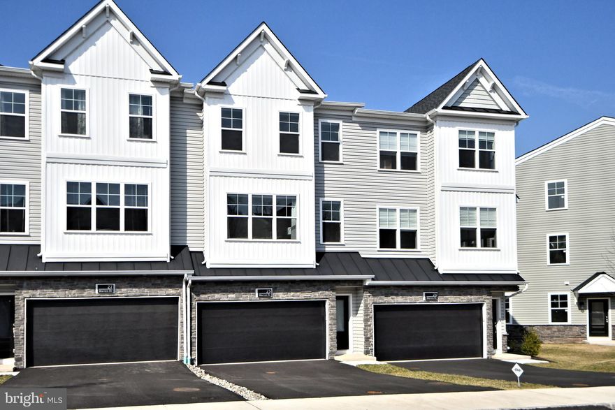 Welcome to this stunning 3-bedroom, 3.1-bath townhome in Chalfont Boro! It looks like a model home and was built by the renowned Judd Builders.  Top notch, quality construction throughout! The sophisticated gourmet kitchen features beautiful, upgraded cabinetry, elegant white quartz counters, a 5-burner gas cooktop, and a double oven. It’s a chef’s dream, complete with chic lighting and luxury flooring. A slider off the kitchen leads to a maintenance-free deck overlooking open space, perfect for a peaceful retreat. Adjacent to the kitchen, the grand great room boasts a cozy electric fireplace,  luxury flooring and lots of natural light.  Ascend the upgraded oak staircase to find three spacious bedrooms, including the owner’s suite with a statement tray ceiling, a generous closet, and a luxurious bathroom with gorgeous vanity. The versatile lower level can be used as a guest room, gym, office, playroom, or den, and includes an optional full bath for added convenience.  This home also has  numerous upgrades throughout including huge storage closet, elegant hardwood staircases, ambient recessed lighting,  modern kitchen backsplash and upgraded flooring, in addition to a 2 car garage. The location couldn't be more perfect as there are many great restaurants, and shopping close by!