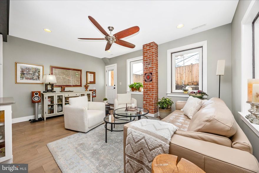 Unique and rare in historic downtown, this beautifully renovated 2-bedroom, 2-bath semi detached Townhome offers a striking blend of industrial architecture and warm urban design. Thoughtfully customized throughout, the home showcases distinctive architectural details, dramatic spaces, and refined finishes.
Open floor plan, engineered hardwood floors in sophisticated gray hues flow through the main living areas, complementing the home’s dramatic high ceilings, original steel beams, exposed brick accents, and a sleek contemporary steel railing that highlights the open architectural design. The chef-inspired kitchen, designed by a French chef, is both beautiful and highly functional. It features professional-grade KitchenAid Pro stainless steel appliances, including a 5-burner gas cooktop. The centerpiece is a Beautifully crafted 7-by-3-foot island with a farmhouse sink and elegant glass-front cabinetry, along with a pantry and abundant cabinet storage for effortless organization. Pictures casement windows brings the sunny outdoors in.
Two spacious light filled Bedrooms with abondant windows. The bathrooms are designed to feel like a private spa. The primary bath includes a spacious 5’ x 5’ walk-in shower finished with Italian ceramic tile and blue-gray pebble flooring, creating a serene and luxurious experience. Solar tubes in the main bath and walk-in closet fill these spaces with natural light. A cozy TV den and washer & dryer conveniently located on the upper level.
Step outside to a private fenced patio finished with beautiful bluestone pavers, flower beds and an herb garden, offering a tranquil outdoor setting perfect for dining, entertaining, or enjoying quiet moments.
Additional features include a garage, extra storage and a private parking space in front of the garage, an exceptional convenience in downtown living.
Half a block from vibrant Market street, lovely Boutiques, high end Restaurants, Arts centers  and Antique stores. Steps to Baker park, Pools, Tennis courts, Pickleball and walking trails. Close access to commuter routes, state parks, wineries and hiking trails.
Downtown  Business zoning. Residential and Commercial.