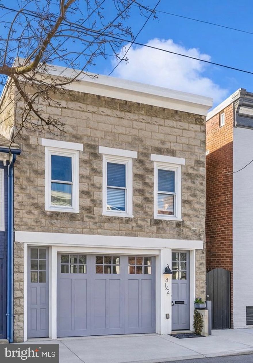 Unique and rare in historic downtown, this beautifully renovated 2-bedroom, 2-bath semi detached Townhome offers a striking blend of industrial architecture and warm urban design. Thoughtfully customized throughout, the home showcases distinctive architectural details, dramatic spaces, and refined finishes.
Open floor plan, engineered hardwood floors in sophisticated gray hues flow through the main living areas, complementing the home’s dramatic high ceilings, original steel beams, exposed brick accents, and a sleek contemporary steel railing that highlights the open architectural design. The chef-inspired kitchen, designed by a French chef, is both beautiful and highly functional. It features professional-grade KitchenAid Pro stainless steel appliances, including a 5-burner gas cooktop. The centerpiece is a Beautifully crafted 7-by-3-foot island with a farmhouse sink and elegant glass-front cabinetry, along with a pantry and abundant cabinet storage for effortless organization. Pictures casement windows brings the sunny outdoors in.
Two spacious light filled Bedrooms with abondant windows. The bathrooms are designed to feel like a private spa. The primary bath includes a spacious 5’ x 5’ walk-in shower finished with Italian ceramic tile and blue-gray pebble flooring, creating a serene and luxurious experience. Solar tubes in the main bath and walk-in closet fill these spaces with natural light. A cozy TV den and washer & dryer conveniently located on the upper level.
Step outside to a private fenced patio finished with beautiful bluestone pavers, flower beds and an herb garden, offering a tranquil outdoor setting perfect for dining, entertaining, or enjoying quiet moments.
Additional features include a garage, extra storage and a private parking space in front of the garage, an exceptional convenience in downtown living.
Half a block from vibrant Market street, lovely Boutiques, high end Restaurants, Arts centers  and Antique stores. Steps to Baker park, Pools, Tennis courts, Pickleball and walking trails. Close access to commuter routes, state parks, wineries and hiking trails.
Downtown  Business zoning. Residential and Commercial.