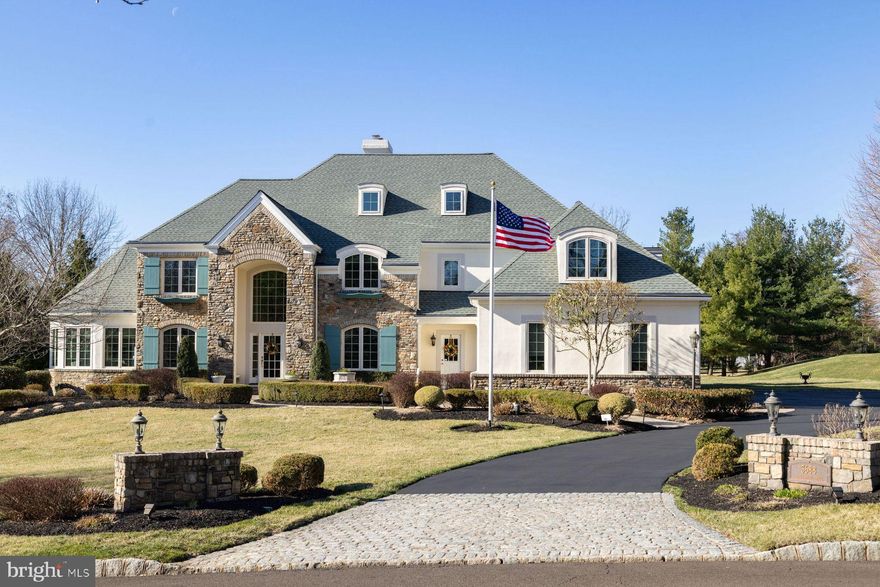 At the edge of charming Doylestown Borough, experience unparalleled luxury in this renovated custom-built Zaveta estate home. The exterior of the home is perfectly complemented by professional landscaping featuring specimen plantings. Step into the grand foyer, a breathtaking introduction to this open and airy home. Beyond, the formal living room offers a serene space for entertaining, while the main floor conservatory captivates with its striking circular design of window-walls and an enchanting hand-painted cathedral ceiling. The heart of the home is an expansive Great Room ideal for both intimate gatherings and entertaining. The expertly renovated gourmet kitchen features beaded inset custom cabinetry with room for everything, Wolf/ SubZero appliances, and expansive granite island. Upstairs, retreat to the primary suite, an elegant sanctuary with cathedral ceilings, a dressing room, and an additional walk-in custom closet. The primary bath was recently renovated and features a Victoria + Albert soaking tub, radiant heated floors, and custom cabinetry with granite counters. The second floor boasts another ensuite bedroom and two additional spacious bedrooms which share a renovated bath. The lower level offers a versatile retreat with a media lounge, play area, and exercise space. An additional private room with full bath completes the lower level. Outside, indulge in the expansive backyard oasis. A sprawling covered porch and expansive veranda, just off the kitchen, overlook the pristine, saltwater pool and stylish/ useful pool house with bath and kitchen. . Recent upgrades include kitchen, bathrooms, paint, replaced roof, gutters, windows, and garage doors, along with a freshly paved driveway. Every detail has been thoughtfully considered to enhance both form and function. This is a perfect location, in the quiet Springfield enclave of homes; a few minutes from Doylestown Borough, 15 minutes to New Hope, with easy access to Princeton, Philadelphia, and under 2 hours to NYC. In the highly sought after Central Bucks School District, this is more than a home — it's a sanctuary of luxury and comfort.