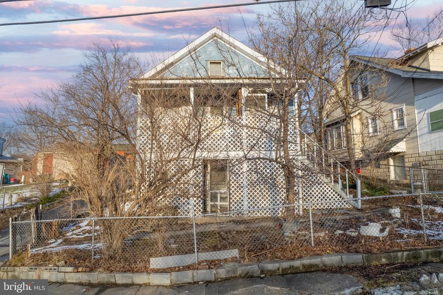 INVESTOR SPECIAL!!! Great opportunity for an investor or fix and flip in the heart of downtown Martinsburg. Location is ideal for commuters. Less than a mile from MARC train and within walking distance of schools. Currently a 2 bedroom one bathroom with a den that was once used as a bedroom.  Roomy enough to covert to a 3  bedroom. Metal roof is original to the 1920's home. Furnace was replaced in the last 5 years. Cellar style basement has outside access through a covered lower porch. Chain link fencing around the entire yard. Rear yard would make for a beautiful garden or possible parking area. Unlock the possibilities of this unique property in downtown Martinsburg, one of the fastest growing areas in the Tri state area.