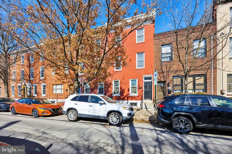 Welcome to this glorious and spacious three-story home located in the vibrant heart of Passyunk Square, directly across from the tranquil and beautiful Columbus Square Park. Nestled within the esteemed Fanny Jackson  Coppin School District, this residence combines timeless elegance with modern amenities, making it the perfect sanctuary for families and entertainers alike.

As you approach this charming brick-front home, you’ll be captivated by its wonderful curb appeal, accentuated by lush foliage from the lovely Square that provides a natural, serene backdrop. The traditional vestibule offers an added layer of privacy, inviting you into an expansive and inviting interior.

Step inside to discover a spacious and timeless layout, featuring original hardwood floors adorned with inlay borders, classic woodwork, and exquisite trim. The grand handcrafted staircase serves as a stunning centerpiece, while the cozy mantle fireplace adds character to the overly spacious living room. The separate dining room is perfect for hosting family gatherings and holiday celebrations, ensuring ample space for entertaining.

Flowing seamlessly from the dining area, the chef’s kitchen is a culinary dream. Outfitted with sleek quartz countertops, contemporary white cabinetry, top-of-the-line stainless steel appliances, and a stylish stainless steel hood, this kitchen is designed for the modern foodie. Recessed lighting and under counter illuminates the space, while a deep soaking sink and a convenient café island provide both functionality and a cozy spot for conversation. Custom  French doors with sliding screens lead to a magnificent private backyard patio, reminiscent of a European villa, complete with a beautiful garden and a custom canopy awning for shade.

The second floor boasts three spacious full-size bedrooms, each filled with gorgeous natural light and featuring ample closet space. Thoughtful accents, such as built-in book shelving and restored original oak five-panel doors, add to the charm of this level. The primary spa-like bathroom is a tranquil oasis, showcasing a rainfall shower with enclosed glass doors, a built-in basin sink, and Italian ceramic tile accents throughout.

Ascend to the third floor, where you’ll find a loft-like primary bedroom that doubles as an entertainment space. This tranquil sanctuary features exposed brick walls, custom mid-century entertainment storage  cherrywood hardwoods, and high ceilings. Full surround windows offer breathtaking views of Center City, and there’s even enough space to create your own rooftop deck—imagine hosting summer gatherings while watching fireworks over the skyline!

The lower-level basement provides ample storage and houses updated mechanicals, ensuring that this home has been meticulously cared for. 

Situated in the heart of Passyunk Square, you'll find yourself just steps away from an array of delightful cafés and restaurants. Enjoy culinary gems like Burrata, Palizzi Club, Mighty Bread, and Reamentor Coffee, while the vibrant East Passyunk Avenue, with its eclectic shopping and dining options, is just two blocks away. Grocery shopping is a breeze with nearby Acme, Sprouts, and Giant, along with CVS for your convenience.
This beautiful home is more than just a residence; it's a lifestyle. Come today and be part of this amazing community in one of Philadelphia's most sought-after neighborhoods!