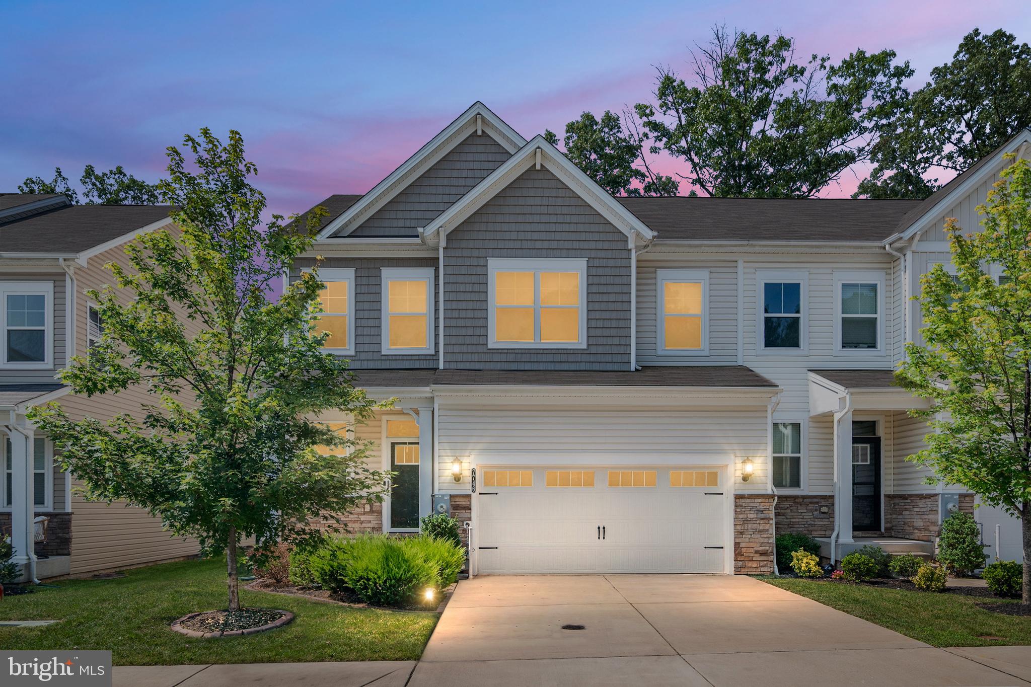 In the sought-after Holly Ridge community, this upgraded 4-bed, 3.5-bath end-unit townhome offers style and convenience. Highlights include wide-plank hardwood floors, crown molding, and a light-filled open layout. The gourmet kitchen features granite counters, stainless steel appliances, and an oversized island—ideal for entertaining.
Enjoy brand-new carpet and fresh paint throughout, including the basement and main level living room. The finished basement includes a 4th bedroom, full bath, and a custom home theater with surround sound.
Step outside to a fenced yard with a stone patio backing to trees. The primary suite offers dual walk-in closets and a spa-like bath. With a 2-car garage, driveway for 2 more, and just 14 miles from Fort Meade, this home is truly move-in ready.