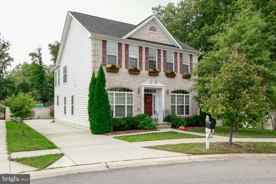 Beautiful upscale home in Southdown Shores! Home shows like a model & features custom paint & decor throughout.  Incredible 2 story great room w/ floor to ceiling stacked stone fireplace.  Gourmet kit w/gas, granite & island. Main level office w/full bath, also 5th bedroom, en suite guest bedroom upstairs & buddy bath.  Finished basement w/rec rm & media area & full bath.  Huge fenced yard!