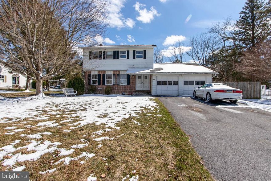 A Diamond in the Rough on Nearly Half an Acre.  Tucked away on a quiet street in the Ramblewood neighborhood, this classic two-story colonial presents a rare opportunity for the buyer with vision and a passion for transformation. With nearly a half acre and solid bones throughout, this home is ready to be reimagined and restored to its full potential.  Step inside to an open living and dining area that offers an easy flow and plenty of natural light, a wonderful canvas for your personal style. The kitchen, while in need of updating, offers generous cabinet space and room to create the culinary space you've always envisioned. Just beyond, the family room steals the show with its classic wood-burning fireplace and built-in shelving creating a warm and inviting heart to the home. A slider leads out to a screened porch overlooking the peaceful, private backyard, the perfect setting for morning coffee or quiet evenings surrounded by nature.  Upstairs, three generously sized bedrooms await, including a primary suite with its own private bath, a thoughtful layout that offers both comfort and privacy. A second full bath serves the remaining bedrooms with ease.  Head downstairs and discover even more living space in the lower level — a versatile area warmed by its own wood-burning stove, making it a cozy retreat no matter the season. Whether you envision a recreation room for family game nights, a home gym to fuel your fitness goals, or a kids' hideaway where imaginations can run wild, this space offers the flexibility to make it entirely your own. The expansive, nearly half-acre lot provides tremendous outdoor potential, whether you dream of gardens, entertaining spaces, or simply room to breathe.  With a two-car garage, a spacious screened porch, and an address in one of the area's most established and peaceful neighborhoods, this property is brimming with possibility. Bring your contractor, bring your creativity, and bring your vision, the next chapter of this home's story is waiting to be written.