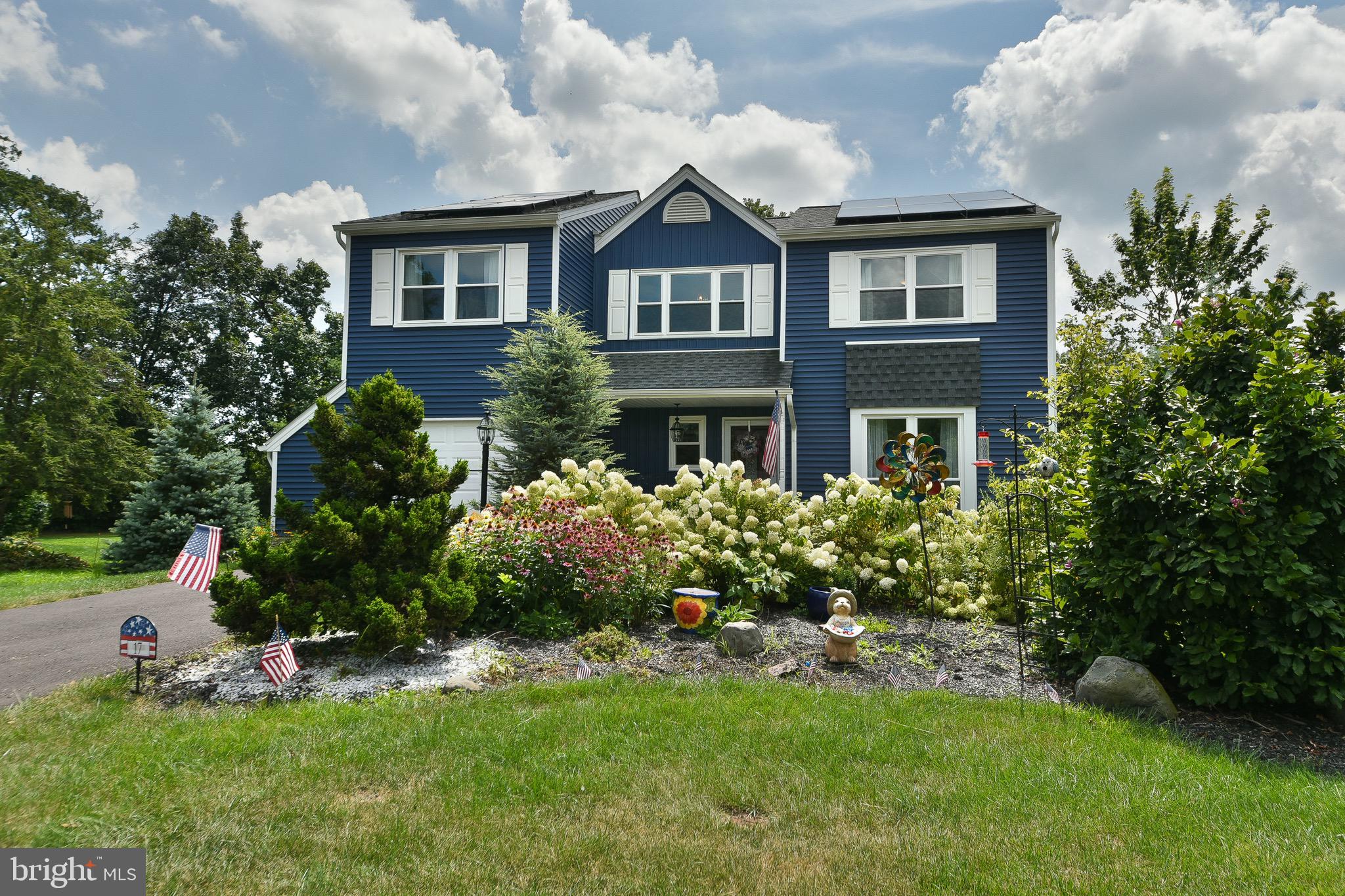 Welcome to 17 Ruhl Drive, situated on a quiet cul-de-sac in Stonebridge! This 4-bedroom, 2.5-bath home has been beautifully maintained and thoughtfully updated, offering both character and modern comfort! The exterior has been fully renovated, with all new siding, front door and cement pad, driveway releveled and resurfaced, windows, brand new roof with 50 year shingles (2021), solar panels (2022), and gutters. Stepping inside, you are greeted by an open concept living and dining room with beautiful natural light. The kitchen was fully renovated in 2024, with slow-close cabinetry, granite countertops, and new appliances, opening to the dining and living areas for an easy flow. The main level also features a renovated half-bathroom. The heart of the home is the gorgeous family room with exposed beams, skylights, and a new propane fireplace (2023)- perfect for gathering. From here, a sliding door leads to a brand-new deck (2025) and a spacious backyard designed for entertaining. Upstairs, the primary suite features a large walk-in closet and a fully remodeled bathroom. Three additional bedrooms and a bonus home office share a central hall bath. This home comes with peace of mind thanks to extensive upgrades (see list of improvements for all updates)!